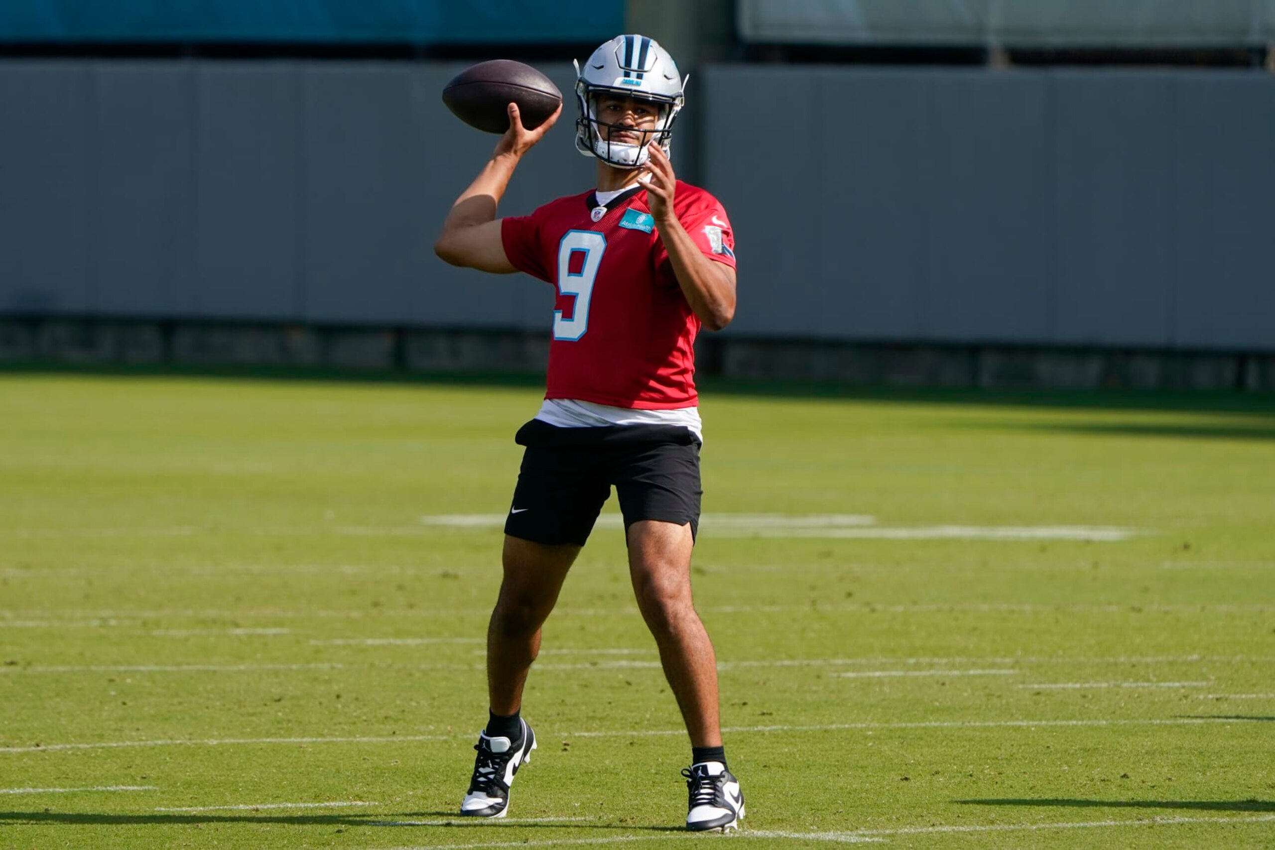 Carolina Panthers quarterback Bryce Young (9) throws a pass during NFL football practice, Thursday, June 1, 2023, in Charlotte, N.C. (AP Photo/Erik Verduzco)