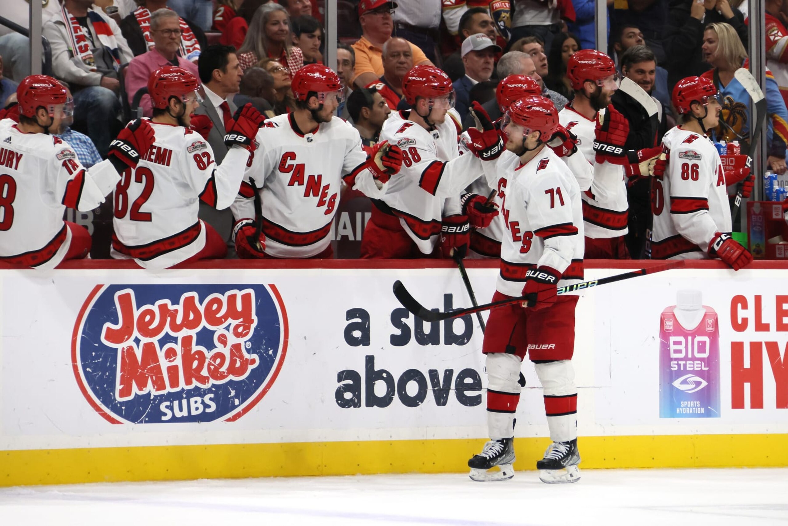 SUNRISE, FLORIDA - MAY 24: Jesper Fast #71 of the Carolina Hurricanes celebrates with his teammates after scoring a goal on Sergei Bobrovsky #72 of the Florida Panthers during the third period in Game Four of the Eastern Conference Final of the 2023 Stanley Cup Playoffs at FLA Live Arena on May 24, 2023 in Sunrise, Florida. (Photo by Bruce Bennett/Getty Images) SUNRISE, FLORIDA - MAY 24: Jesper Fast #71 of the Carolina Hurricanes celebrates with his teammates after scoring a goal on Sergei Bobrovsky #72 of the Florida Panthers during the third period in Game Four of the Eastern Conference Final of the 2023 Stanley Cup Playoffs at FLA Live Arena on May 24, 2023 in Sunrise, Florida. (Photo by Bruce Bennett/Getty Images)