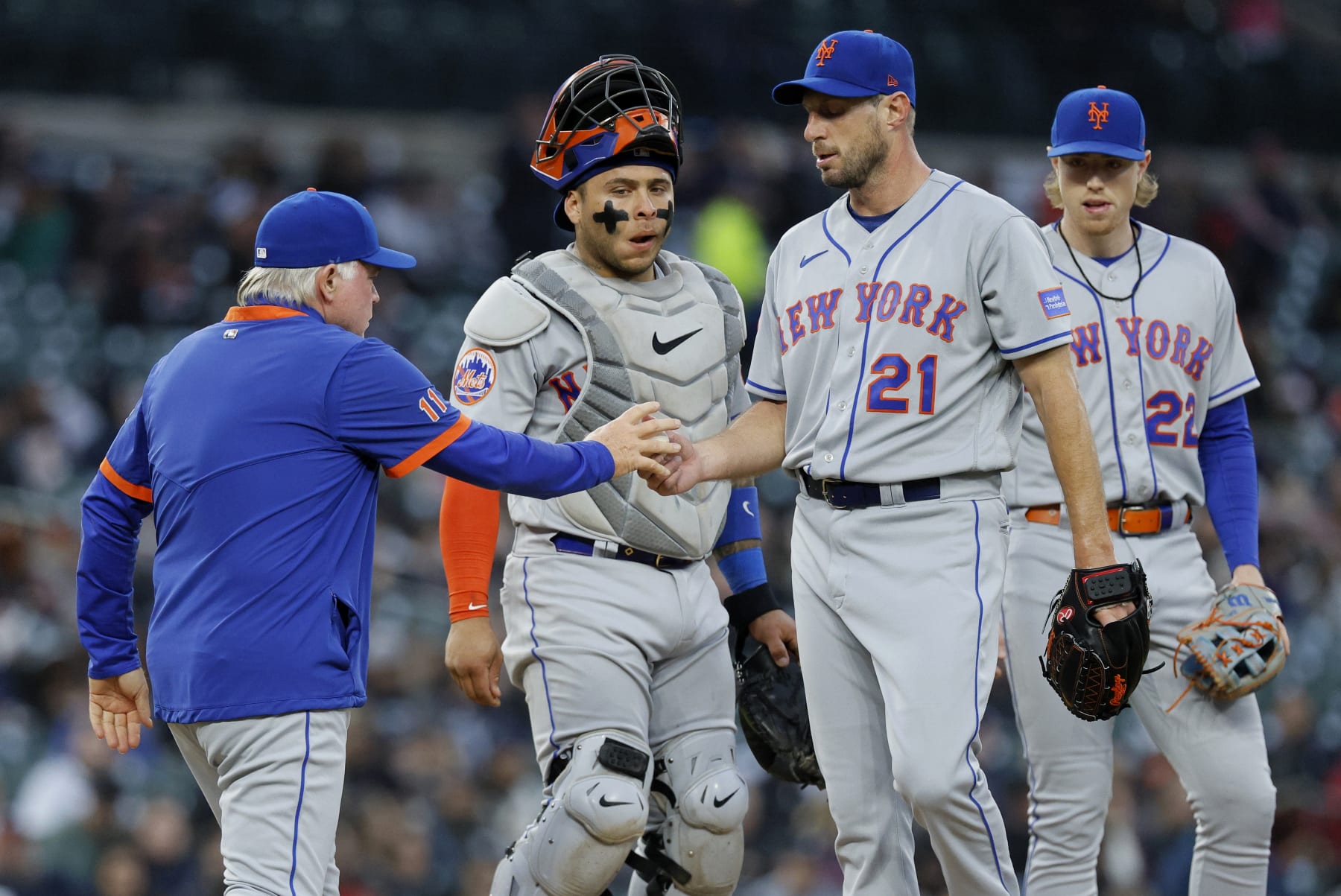 DETROIT, MI -  MAY 3:  Starting pitcher Max Scherzer #21 of the New York Mets is pulled by manager Buck Showalter #11, with catcher Francisco Alvarez #4 and Brett Baty #22 looking on, during the fourth inning of game two of a doubleheader against the Detroit Tigers at at Comerica Park on May 3, 2023 in Detroit, Michigan. (Photo by Duane Burleson/Getty Images)