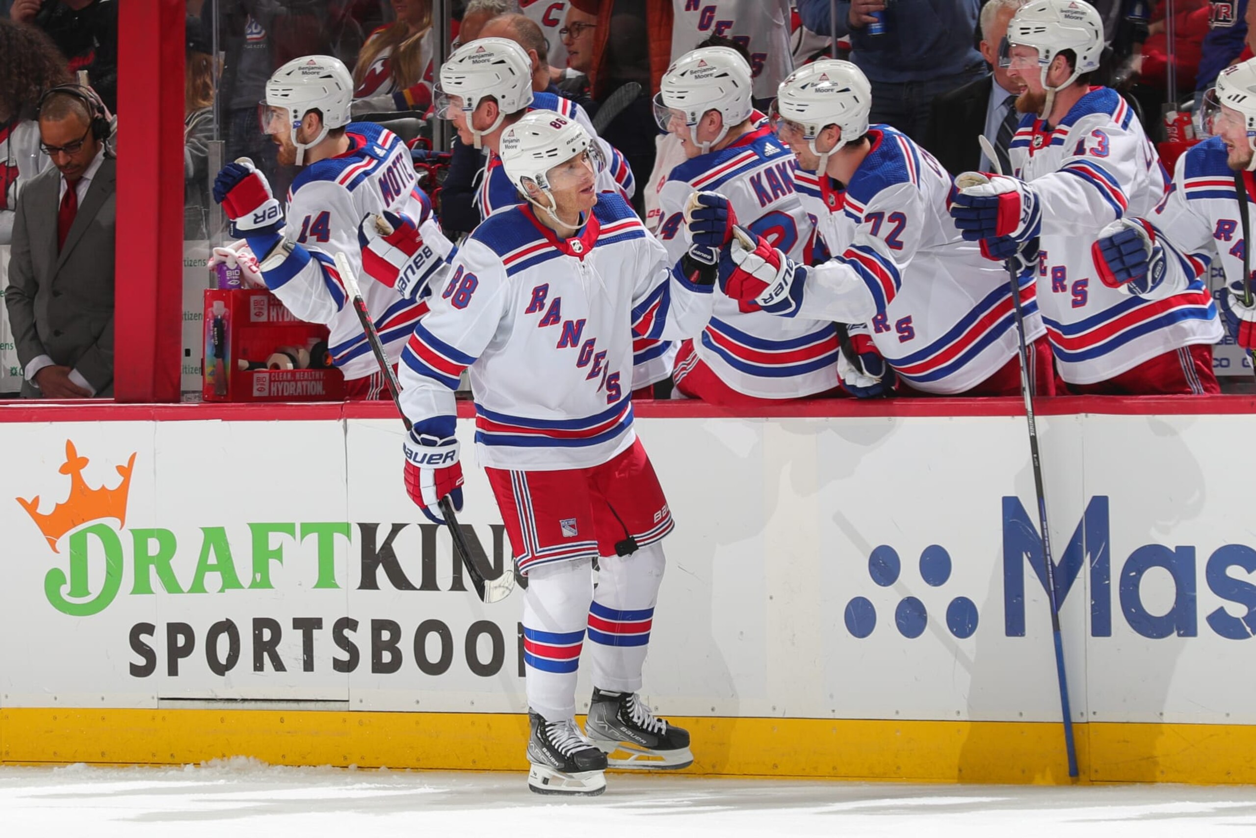 NEWARK, NJ - APRIL 20: Patrick Kane #88 of the New York Rangers celebrates at the bench after scoring during Game Two of the First Round of the 2023 Stanley Cup Playoffs at the Prudential Center on April 20, 2023 in Newark, New Jersey. (Photo by Rich Graessle/NHLI via Getty Images) NEWARK, NJ - APRIL 20: Patrick Kane #88 of the New York Rangers celebrates at the bench after scoring during Game Two of the First Round of the 2023 Stanley Cup Playoffs at the Prudential Center on April 20, 2023 in Newark, New Jersey. (Photo by Rich Graessle/NHLI via Getty Images)