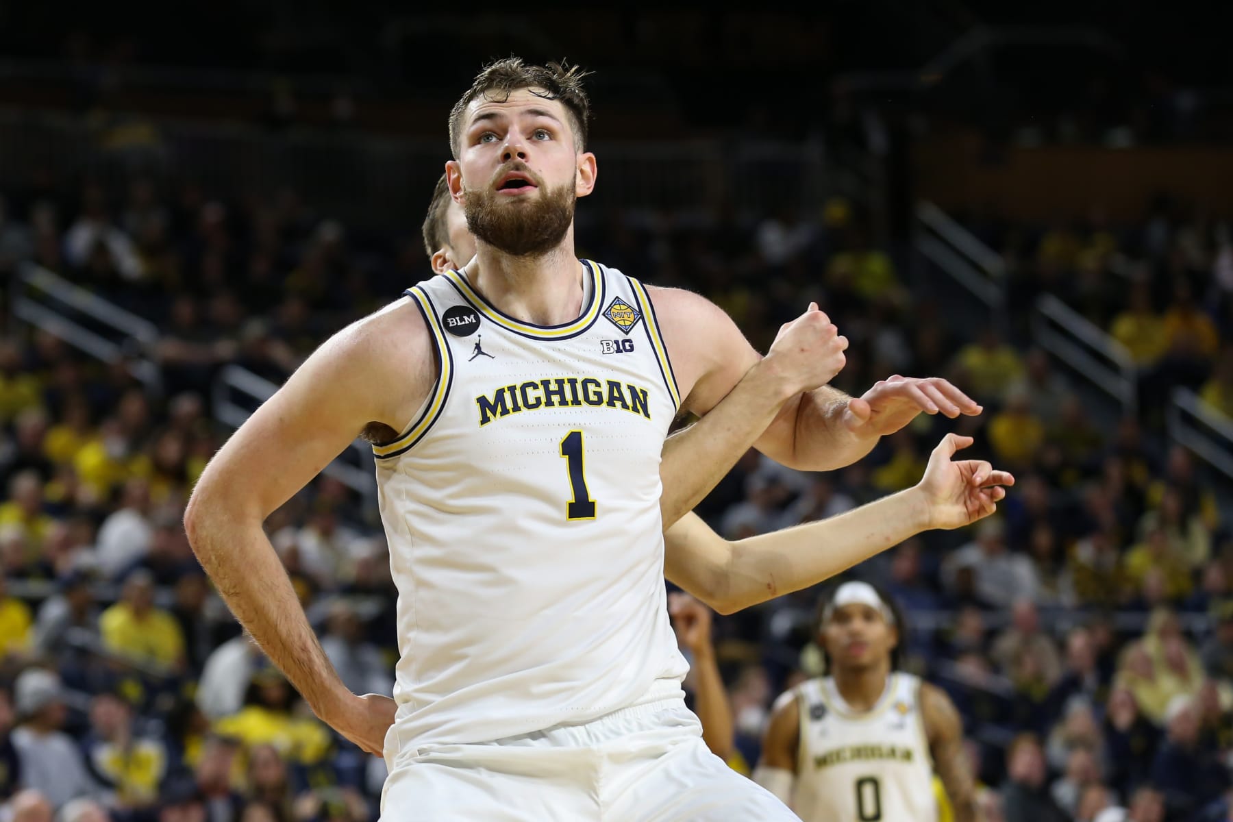 ANN ARBOR, MI - MARCH 14: Michigan Wolverines center Hunter Dickinson (1) gets rebounding position during a first round basketball game of the National Invitational Tournament between the Toledo Rockets and the Michigan Wolverines on March 14, 2023 at the Crisler Center in Ann Arbor, Michigan. (Photo by Scott W. Grau/Icon Sportswire via Getty Images) ANN ARBOR, MI - MARCH 14: Michigan Wolverines center Hunter Dickinson (1) gets rebounding position during a first round basketball game of the National Invitational Tournament between the Toledo Rockets and the Michigan Wolverines on March 14, 2023 at the Crisler Center in Ann Arbor, Michigan. (Photo by Scott W. Grau/Icon Sportswire via Getty Images)