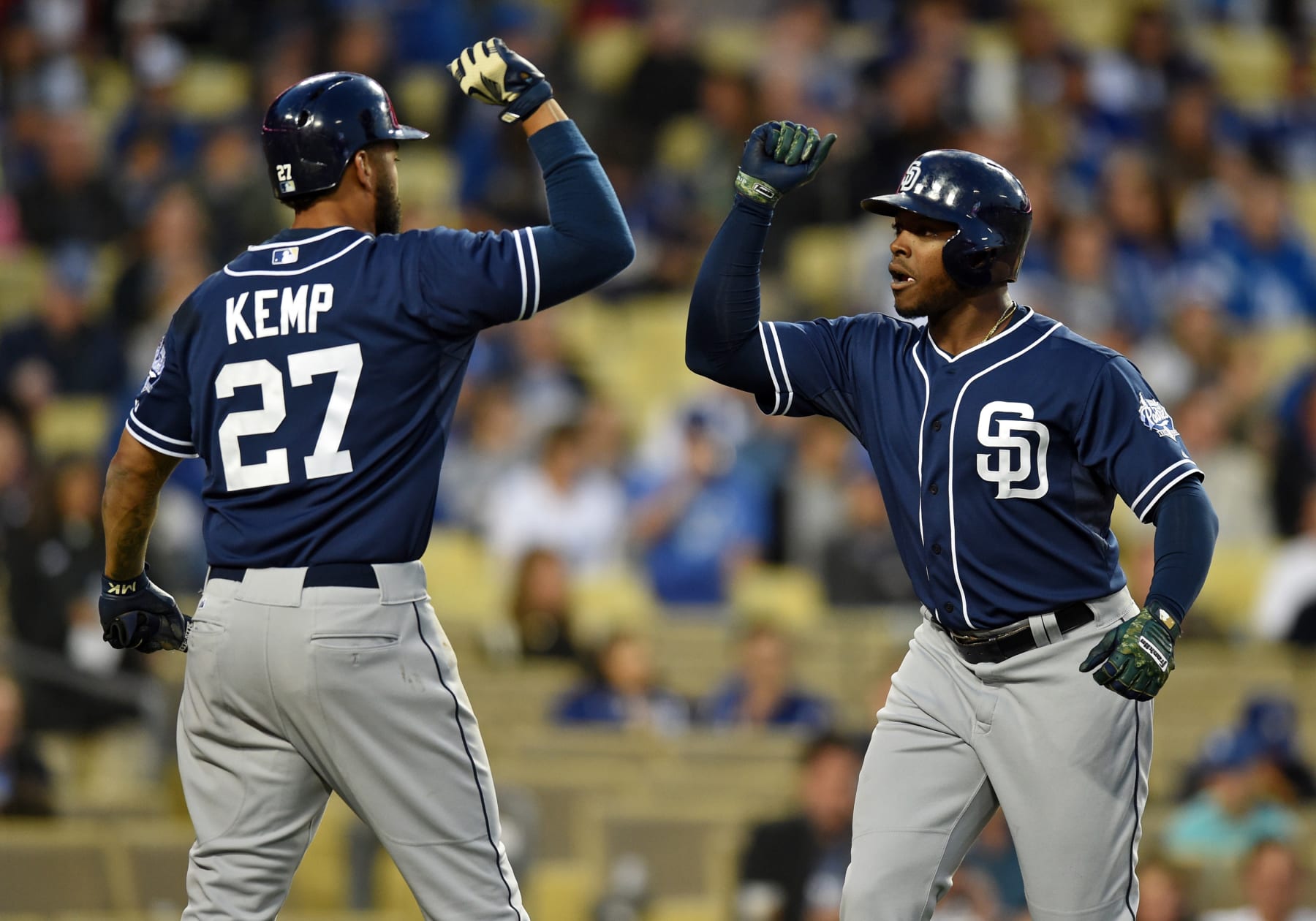 08 April 2015: San Diego Padres Left field Justin Upton (10) [6138] is congratulated by San Diego Padres Right field Matt Kemp (27) [3976] after hitting a two run home run during a Major League Baseball game between the San Diego Padres and the Los Angeles Dodgers at Dodger Stadium in Los Angeles, CA. (Photo by Chris Williams/Icon Sportswire/Corbis/Icon Sportswire via Getty Images)