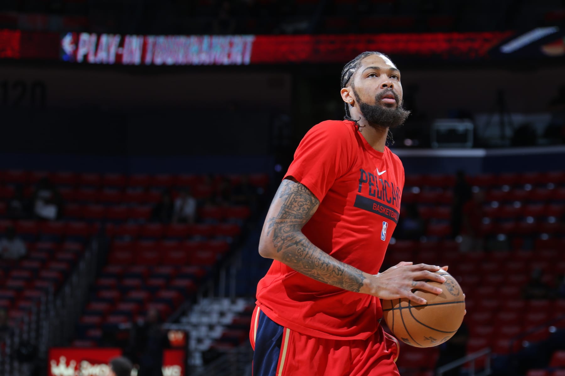 NEW ORLEANS, LA - APRIL 12: Brandon Ingram #14 of the New Orleans Pelicans warms up against the Oklahoma City Thunder during the 2023 Play-In Tournament on April 12, 2023 at the Smoothie King Center in New Orleans, Louisiana. NOTE TO USER: User expressly acknowledges and agrees that, by downloading and or using this Photograph, user is consenting to the terms and conditions of the Getty Images License Agreement. Mandatory Copyright Notice: Copyright 2023 NBAE (Photo by Layne Murdoch Jr./NBAE via Getty Images)
