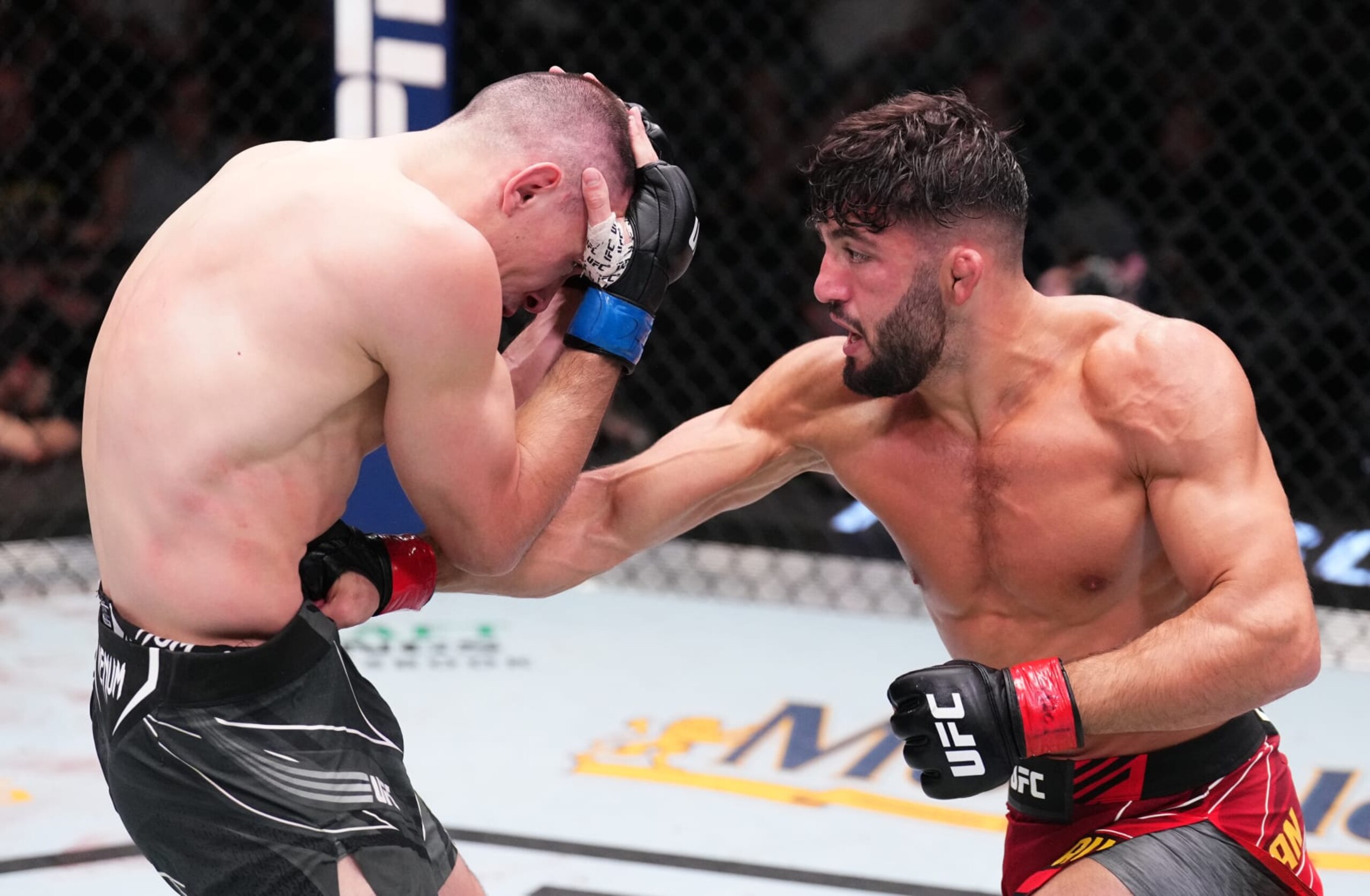 Arman Tsarukyan punches Damir Ismagulov.