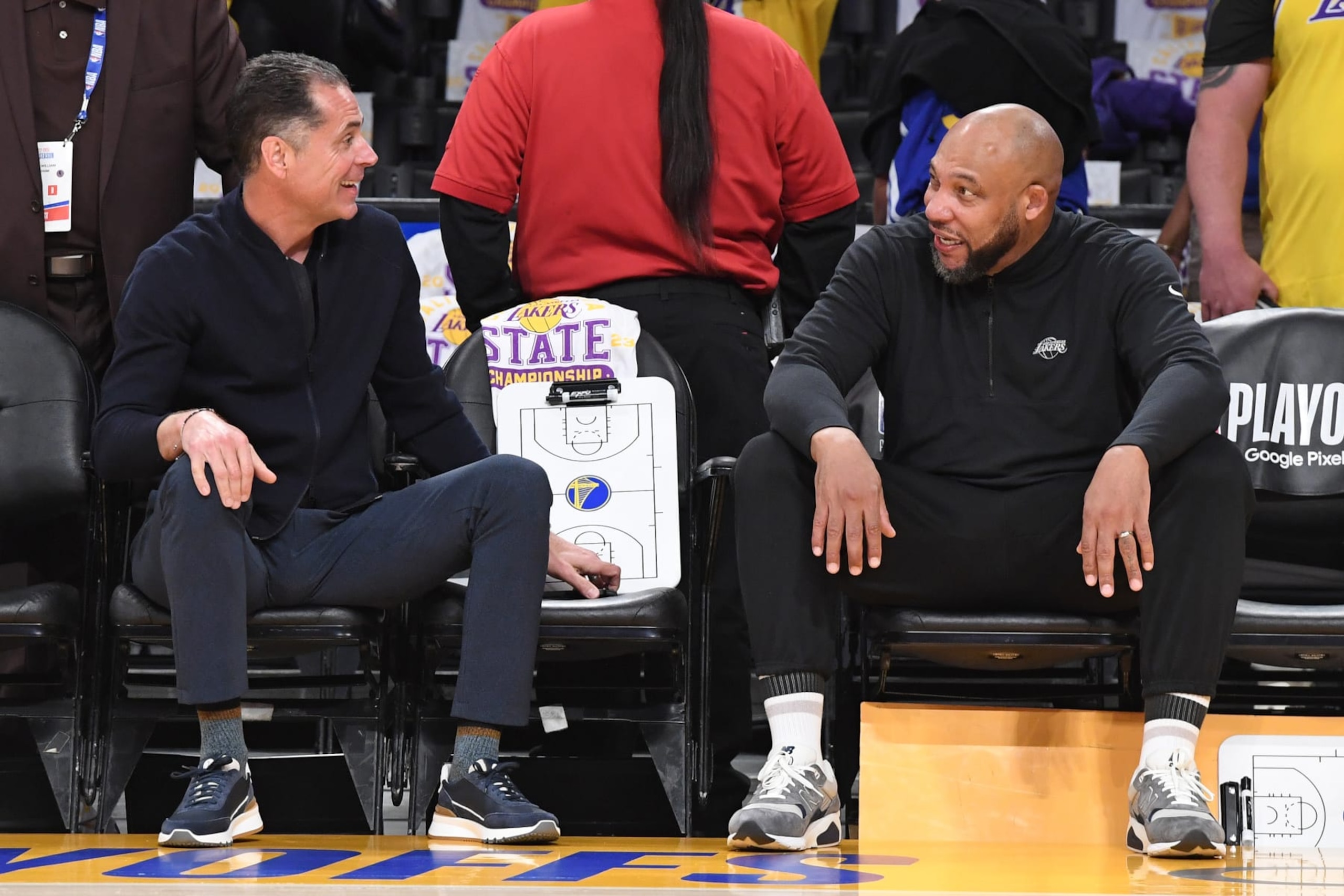 LOS ANGELES, CA - MAY 6: Rob Pelinka and Head Coach Darvin Ham of the Los Angeles Lakers talk before the game against the Golden State Warriors during Round 2 Game 3 of the Western Conference Semi-Finals 2023 NBA Playoffs on May 6, 2023 at Crypto.Com Arena in Los Angeles, California. NOTE TO USER: User expressly acknowledges and agrees that, by downloading and/or using this Photograph, user is consenting to the terms and conditions of the Getty Images License Agreement. Mandatory Copyright Notice: Copyright 2023 NBAE (Photo by Andrew D. Bernstein/NBAE via Getty Images)