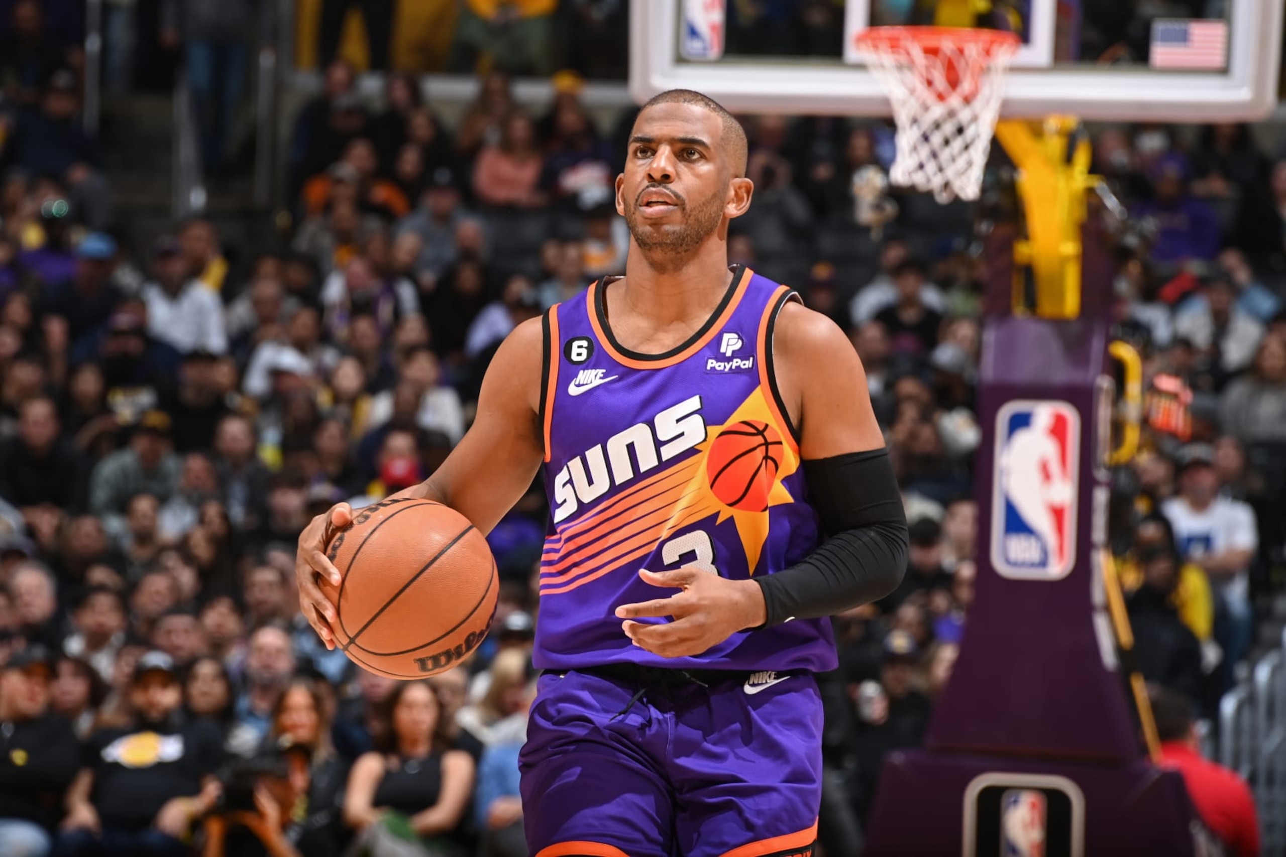 LOS ANGELES, CA - MARCH 22:  Chris Paul #3 of the Phoenix Suns goes to the basket during the game on March 22, 2023 at Crypto.Com Arena in Los Angeles, California. NOTE TO USER: User expressly acknowledges and agrees that, by downloading and/or using this Photograph, user is consenting to the terms and conditions of the Getty Images License Agreement. Mandatory Copyright Notice: Copyright 2023 NBAE (Photo by Andrew D. Bernstein/NBAE via Getty Images)