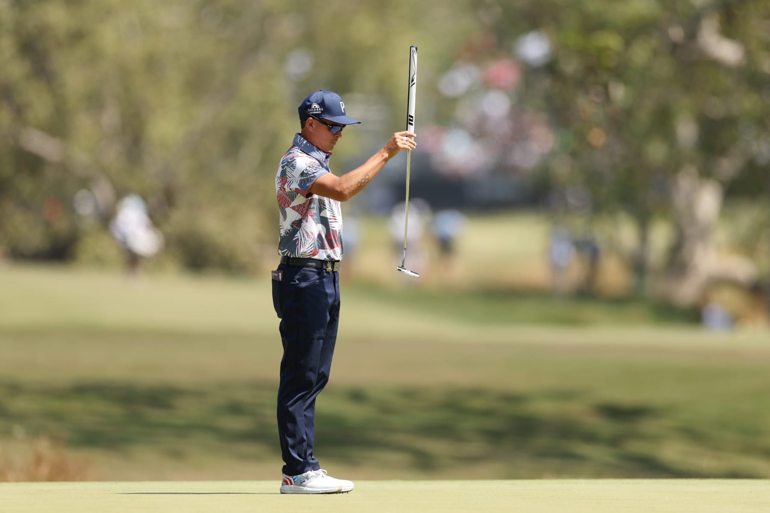 LOS ANGELES, CALIFORNIA - JUNE 16: Rickie Fowler of the United States lines up a putt on the fourth green during the second round of the 123rd U.S. Open Championship at The Los Angeles Country Club on June 16, 2023 in Los Angeles, California. (Photo by Ezra Shaw/Getty Images)
