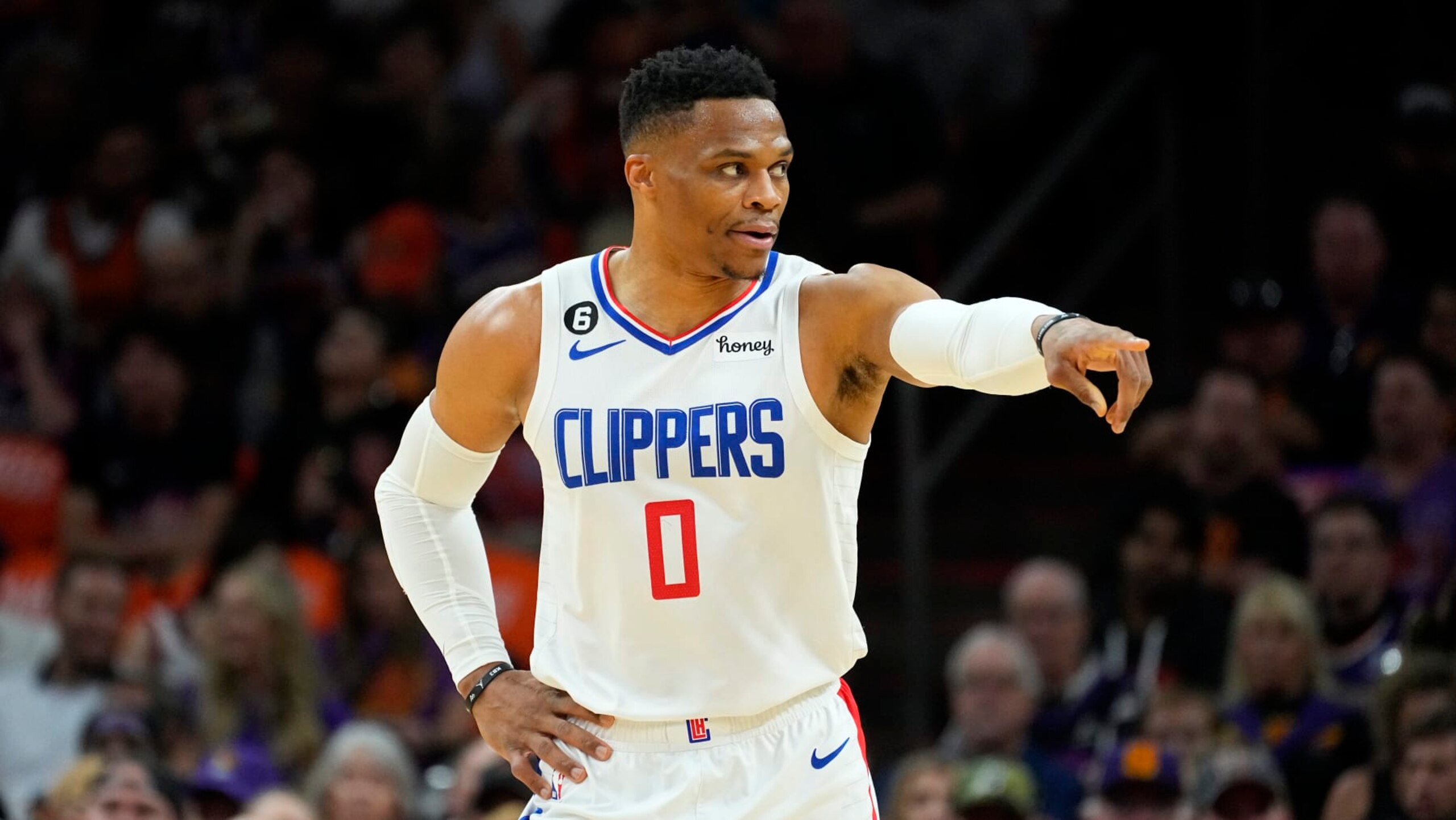 Los Angeles Clippers guard Russell Westbrook (0) motions to a teammate during Game 5 of a first-round NBA basketball playoff series against the Phoenix Suns, Tuesday, April 25, 2023, in Phoenix. (AP Photo/Matt York)