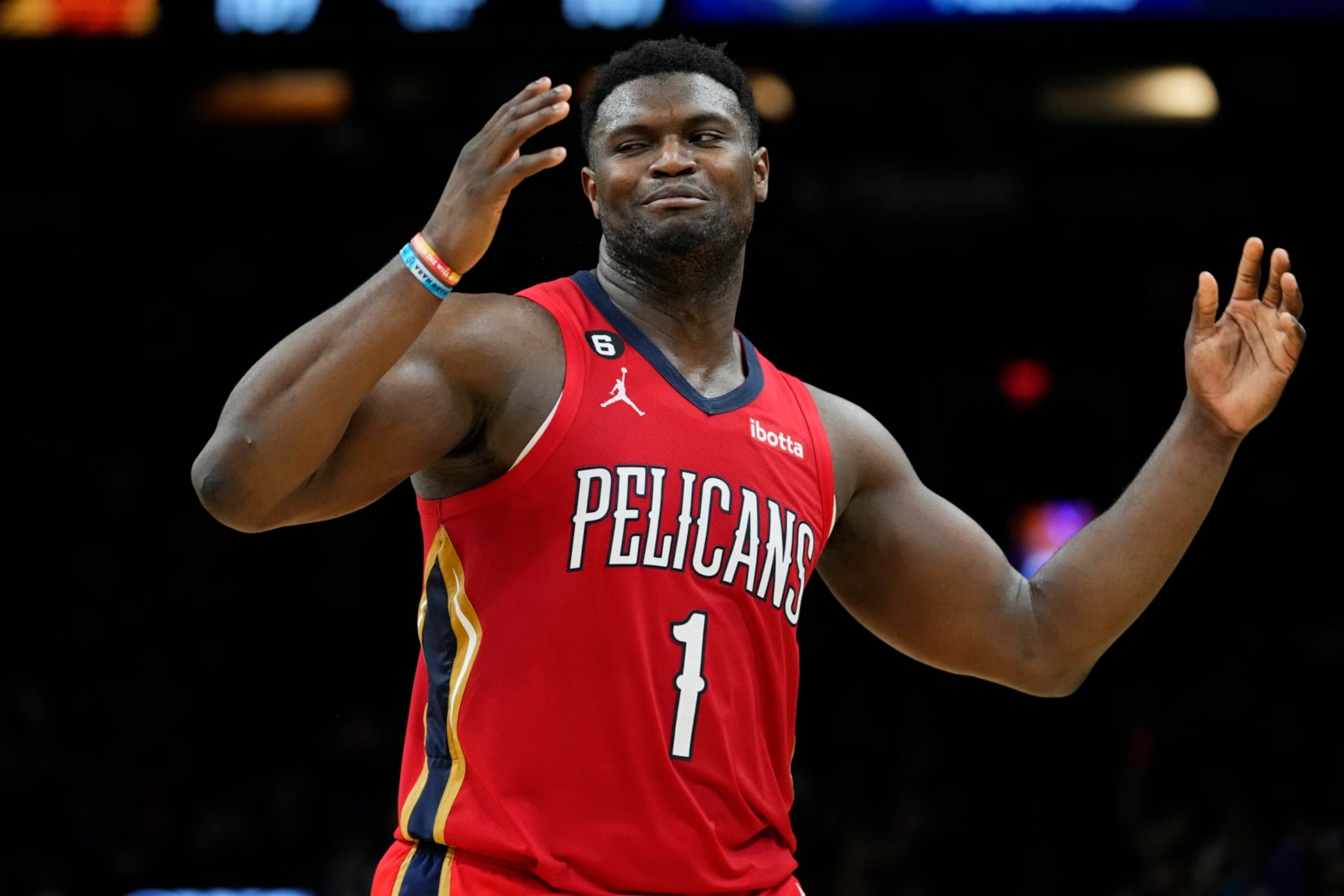 New Orleans Pelicans forward Zion Williamson (1) reacts to a foul call during the second half of an NBA basketball game against the Phoenix Suns, Saturday, Dec. 17, 2022, in Phoenix. (AP Photo/Matt York)