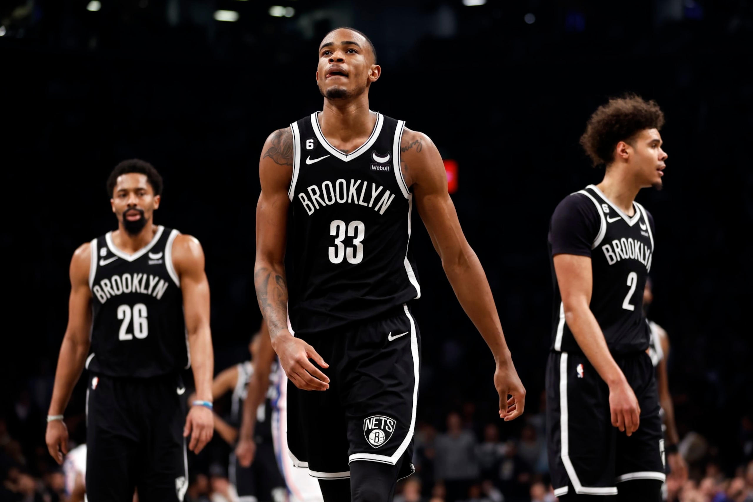 Spencer Dinwiddie, Nic Claxton and Cameron Johnson