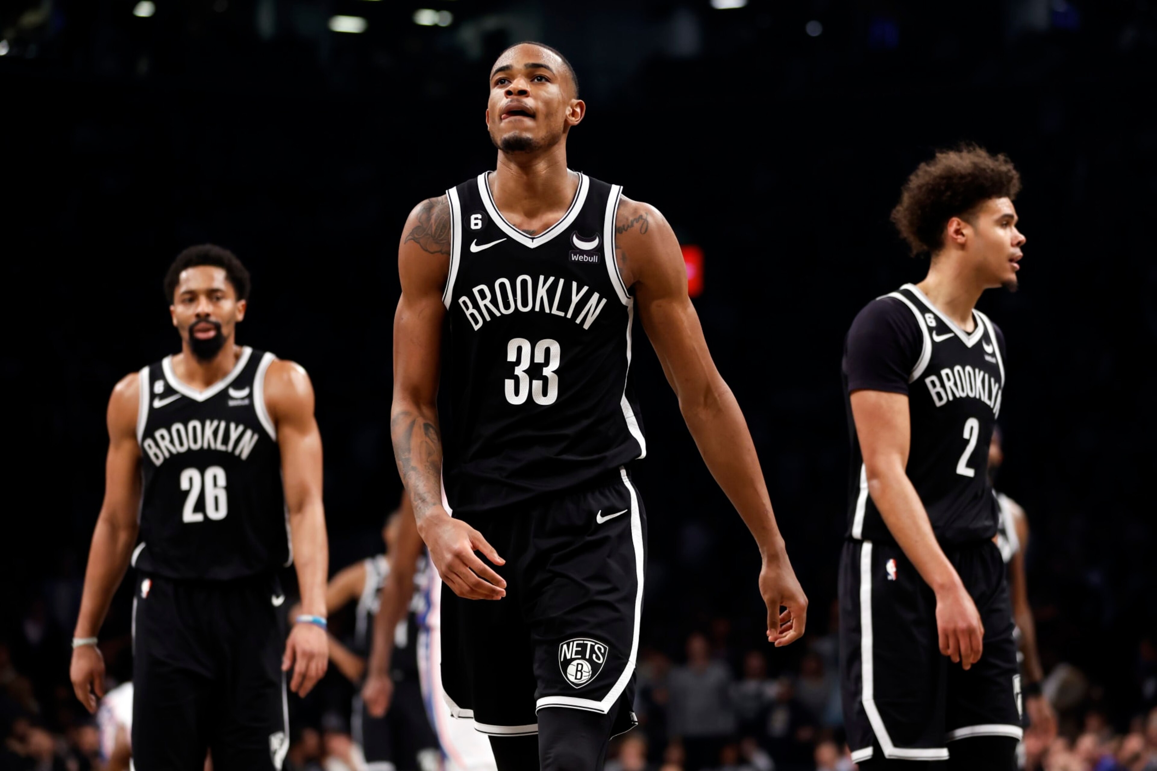 Spencer Dinwiddie, Nic Claxton and Cameron Johnson
