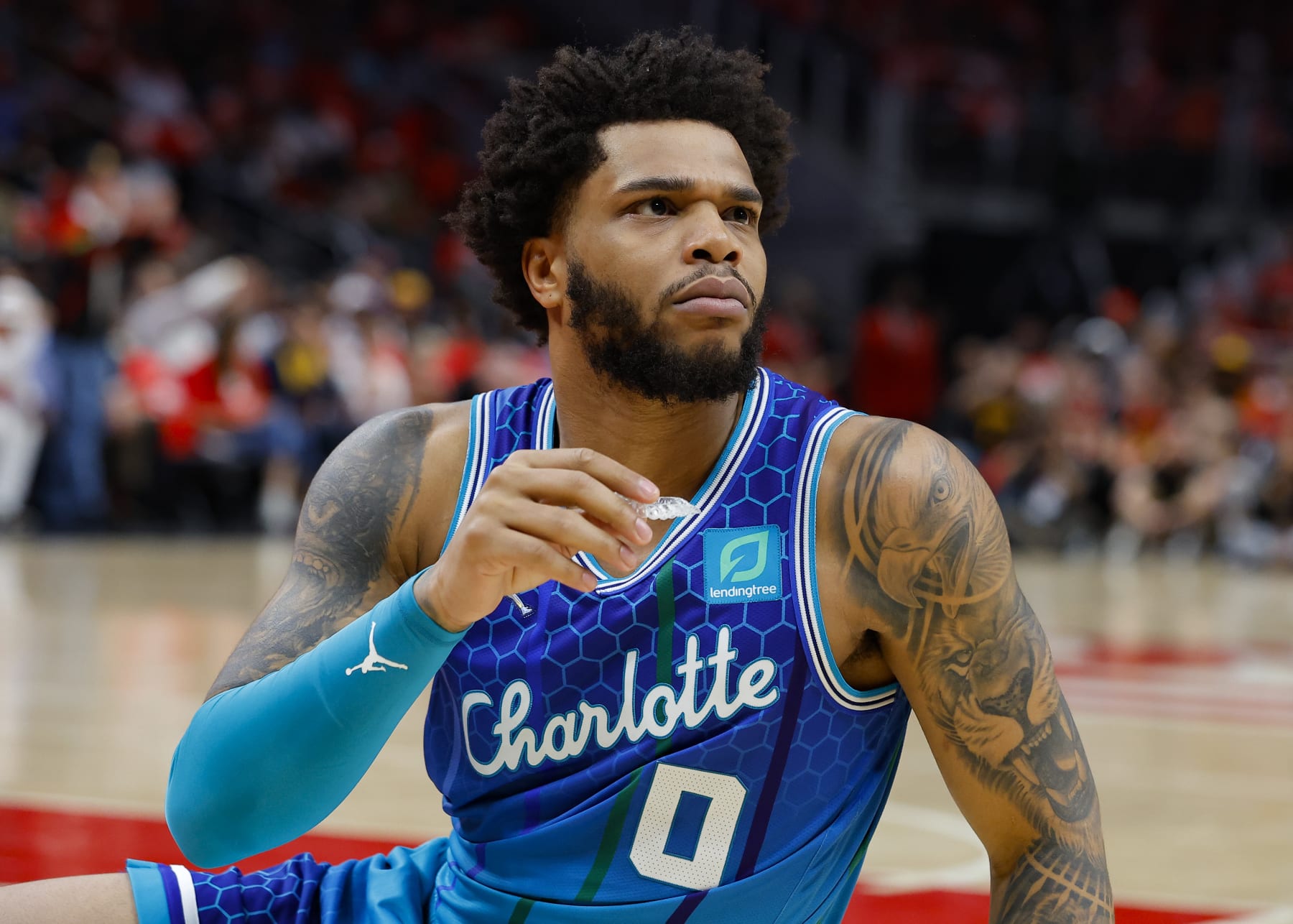 ATLANTA, GA - APRIL 13: Miles Bridges #0 of the Charlotte Hornets reacts after a foul is called during the first half against the Atlanta Hawks at State Farm Arena on April 13, 2022 in Atlanta, Georgia. NOTE TO USER: User expressly acknowledges and agrees that, by downloading and or using this photograph, User is consenting to the terms and conditions of the Getty Images License Agreement. (Photo by Todd Kirkland/Getty Images)