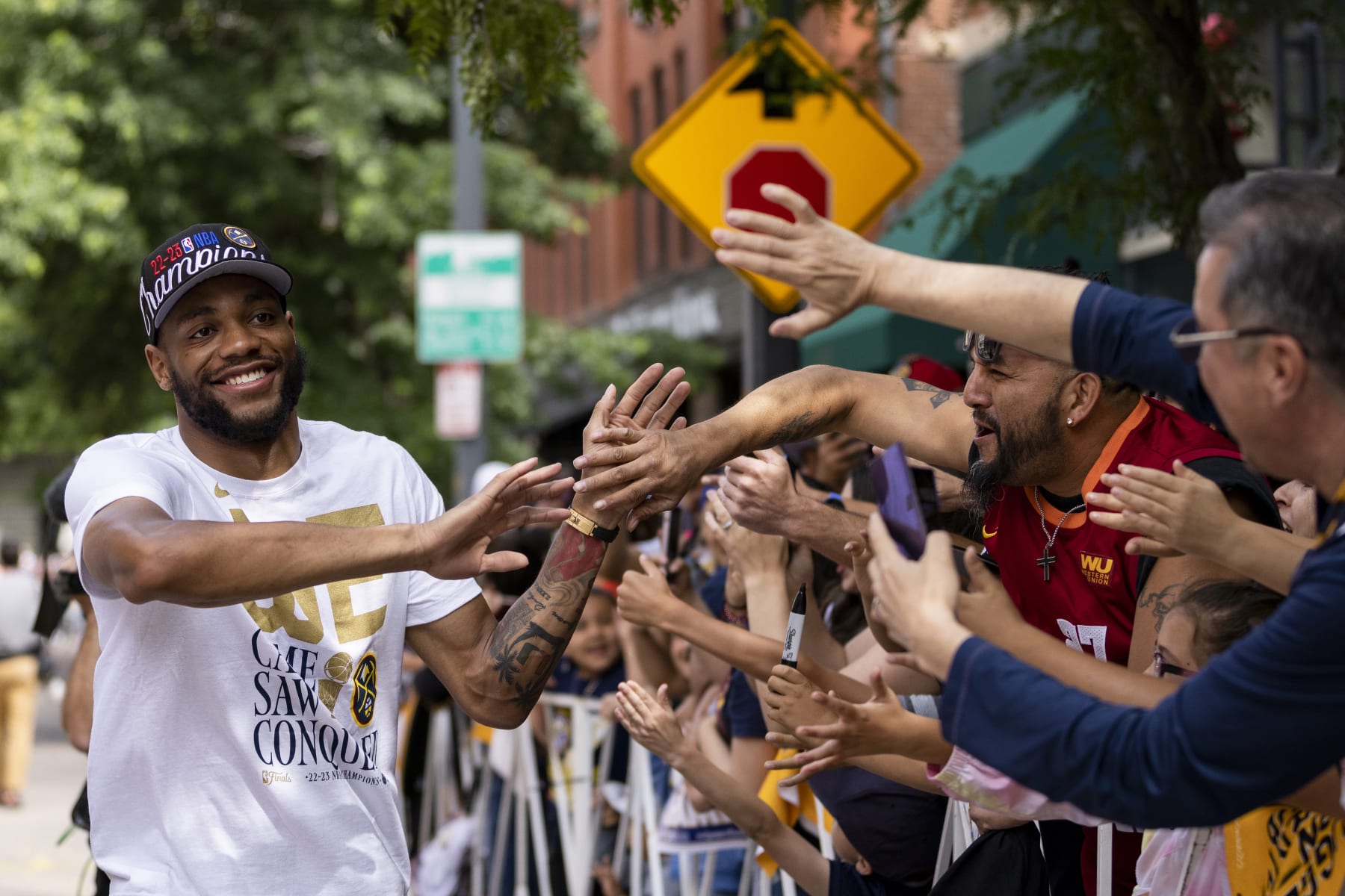 DENVER, CO - JUNE 15: Bruce Brown #11 of the Denver Nuggets celebrates during the 2023 Denver Nuggets Championship Parade on June 15, 2023 in Denver, Colorado. NOTE TO USER: User expressly acknowledges and agrees that, by downloading and/or using this Photograph, user is consenting to the terms and conditions of the Getty Images License Agreement. Mandatory Copyright Notice: Copyright 2023 NBAE (Photo by Ben Swanson/NBAE via Getty Images)