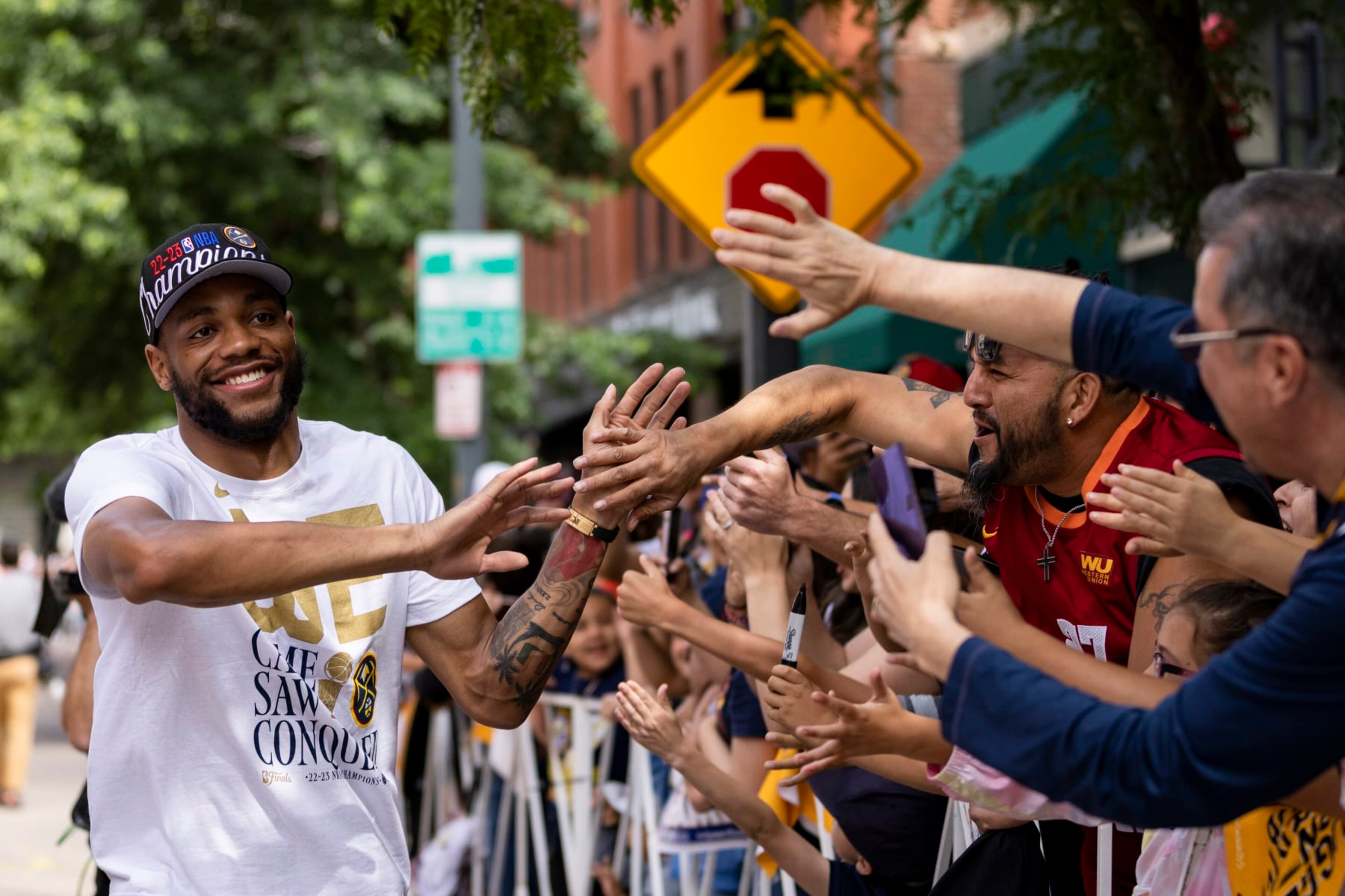 DENVER, CO - JUNE 15: Bruce Brown #11 of the Denver Nuggets celebrates during the 2023 Denver Nuggets Championship Parade on June 15, 2023 in Denver, Colorado. NOTE TO USER: User expressly acknowledges and agrees that, by downloading and/or using this Photograph, user is consenting to the terms and conditions of the Getty Images License Agreement. Mandatory Copyright Notice: Copyright 2023 NBAE (Photo by Ben Swanson/NBAE via Getty Images)