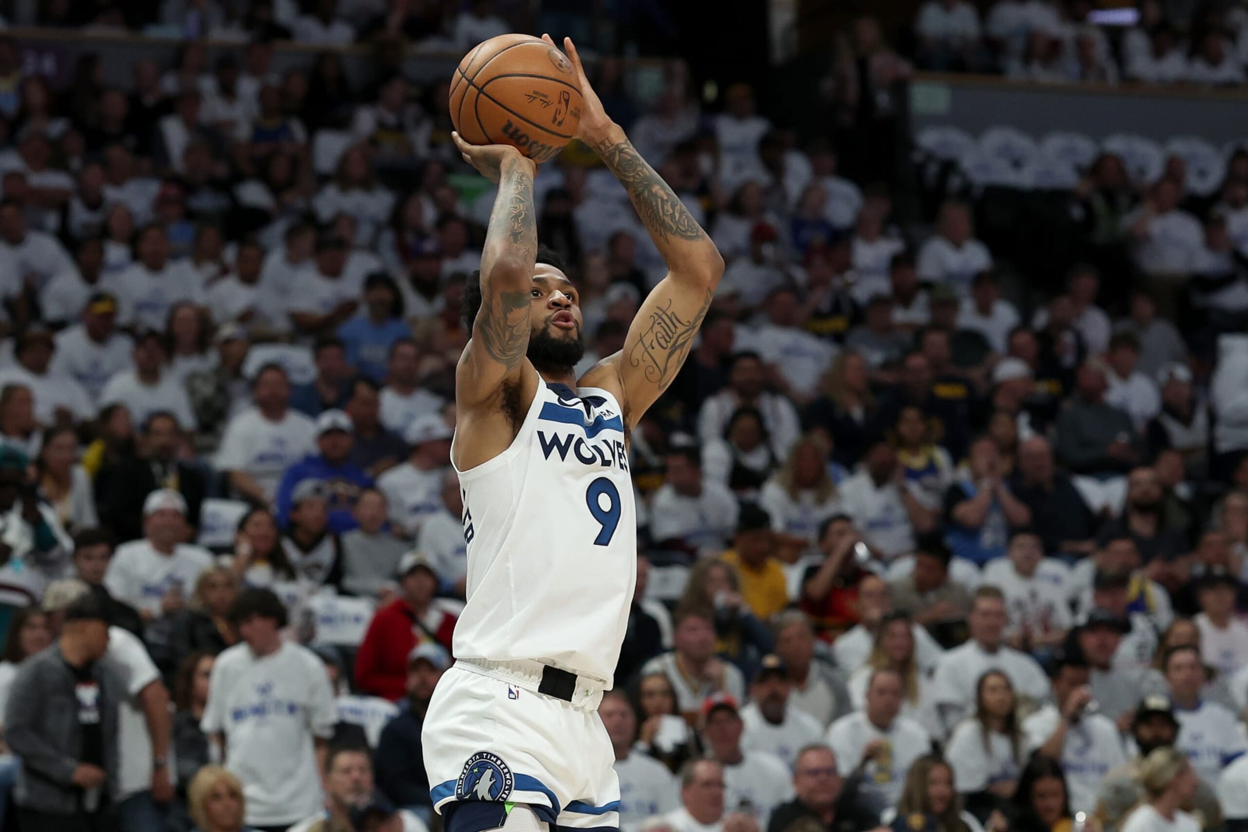 DENVER, COLORADO - APRIL 16: Nickeil Alexander-Walker #9 of the Minnesota Timberwolves puts up a shot against the Denver Nuggets in the first quarter during Round 1 Game 1 of the NBA Playoffs at Ball Arena on April 16, 2023 in Denver, Colorado. NOTE TO USER: User expressly acknowledges and agrees that, by downloading and/or using this photograph, User is consenting to the terms and conditions of the Getty Images License Agreement. (Photo by Matthew Stockman/Getty Images)