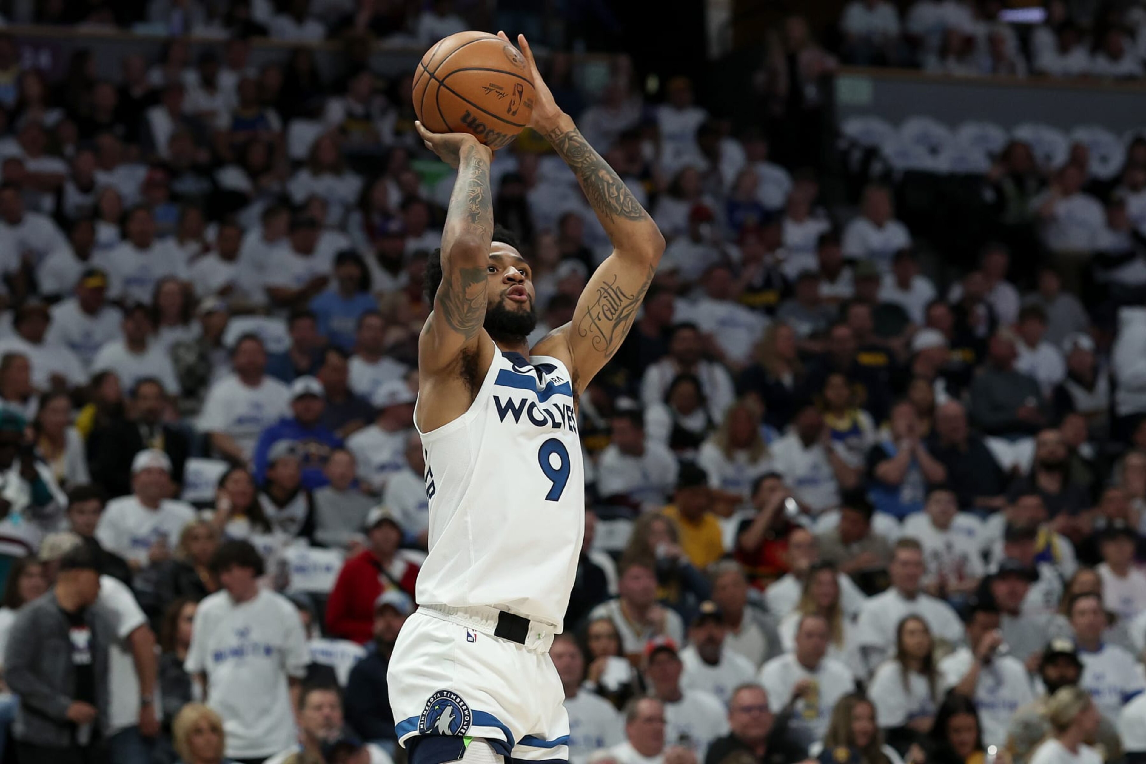 DENVER, COLORADO - APRIL 16: Nickeil Alexander-Walker #9 of the Minnesota Timberwolves puts up a shot against the Denver Nuggets in the first quarter during Round 1 Game 1 of the NBA Playoffs at Ball Arena on April 16, 2023 in Denver, Colorado. NOTE TO USER: User expressly acknowledges and agrees that, by downloading and/or using this photograph, User is consenting to the terms and conditions of the Getty Images License Agreement. (Photo by Matthew Stockman/Getty Images)