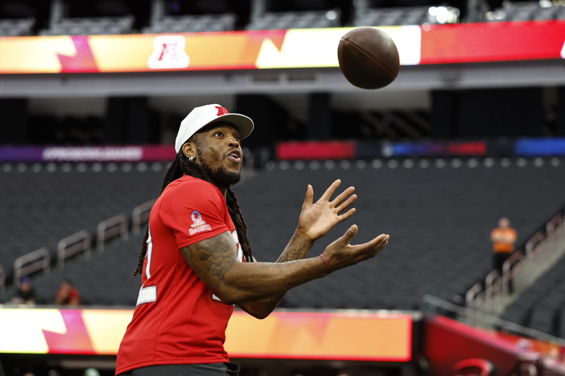 LAS VEGAS, NEVADA - FEBRUARY 04: AFC running back Derrick Henry #22 of the Tennesse Titans completes a pass during a practice session prior to an NFL Pro Bowl football game at Allegiant Stadium on February 04, 2023 in Las Vegas, Nevada. (Photo by Michael Owens/Getty Images)