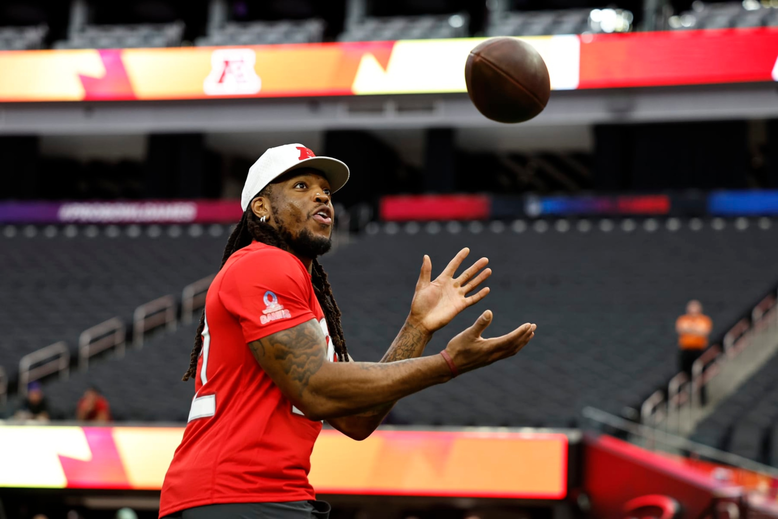 LAS VEGAS, NEVADA - FEBRUARY 04: AFC running back Derrick Henry #22 of the Tennesse Titans completes a pass during a practice session prior to an NFL Pro Bowl football game at Allegiant Stadium on February 04, 2023 in Las Vegas, Nevada. (Photo by Michael Owens/Getty Images)