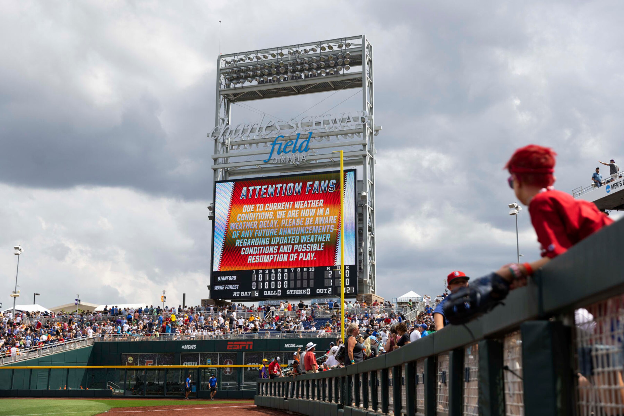 Due to a lightning strike nearby, the game is delayed in the seventh inning as Stanford plays against Wake Forest in a baseball game at the NCAA College World Series in Omaha, Neb., on Saturday, June 17, 2023. (AP Photo/Rebecca S. Gratz)