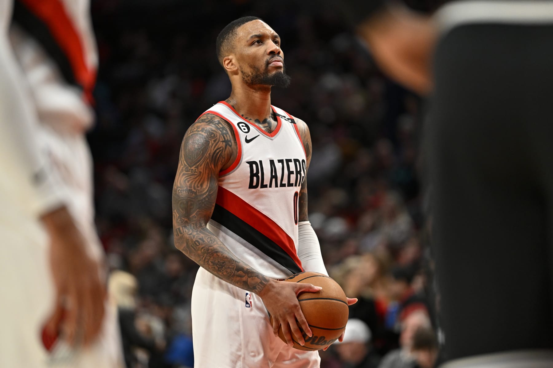 PORTLAND, OREGON - MARCH 19: Damian Lillard #0 of the Portland Trail Blazers eyes the basket before shooting a free throw during the third quarter against the LA Clippers at the Moda Center on March 19, 2023 in Portland, Oregon. The LA Clippers won 117-102. NOTE TO USER: User expressly acknowledges and agrees that, by downloading and or using this photograph, User is consenting to the terms and conditions of the Getty Images License Agreement. (Photo by Alika Jenner/Getty Images)