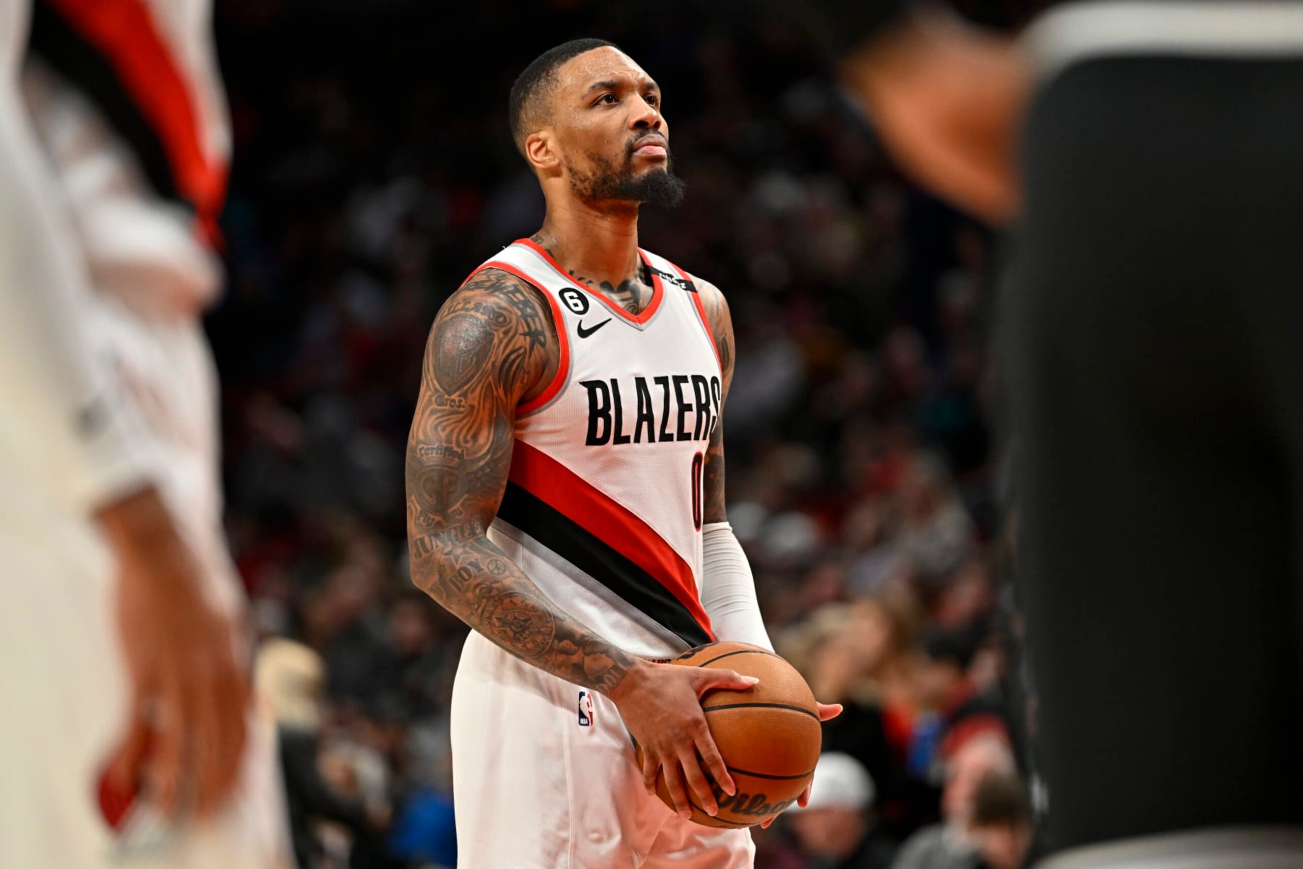 PORTLAND, OREGON - MARCH 19: Damian Lillard #0 of the Portland Trail Blazers eyes the basket before shooting a free throw during the third quarter against the LA Clippers at the Moda Center on March 19, 2023 in Portland, Oregon. The LA Clippers won 117-102. NOTE TO USER: User expressly acknowledges and agrees that, by downloading and or using this photograph, User is consenting to the terms and conditions of the Getty Images License Agreement. (Photo by Alika Jenner/Getty Images)