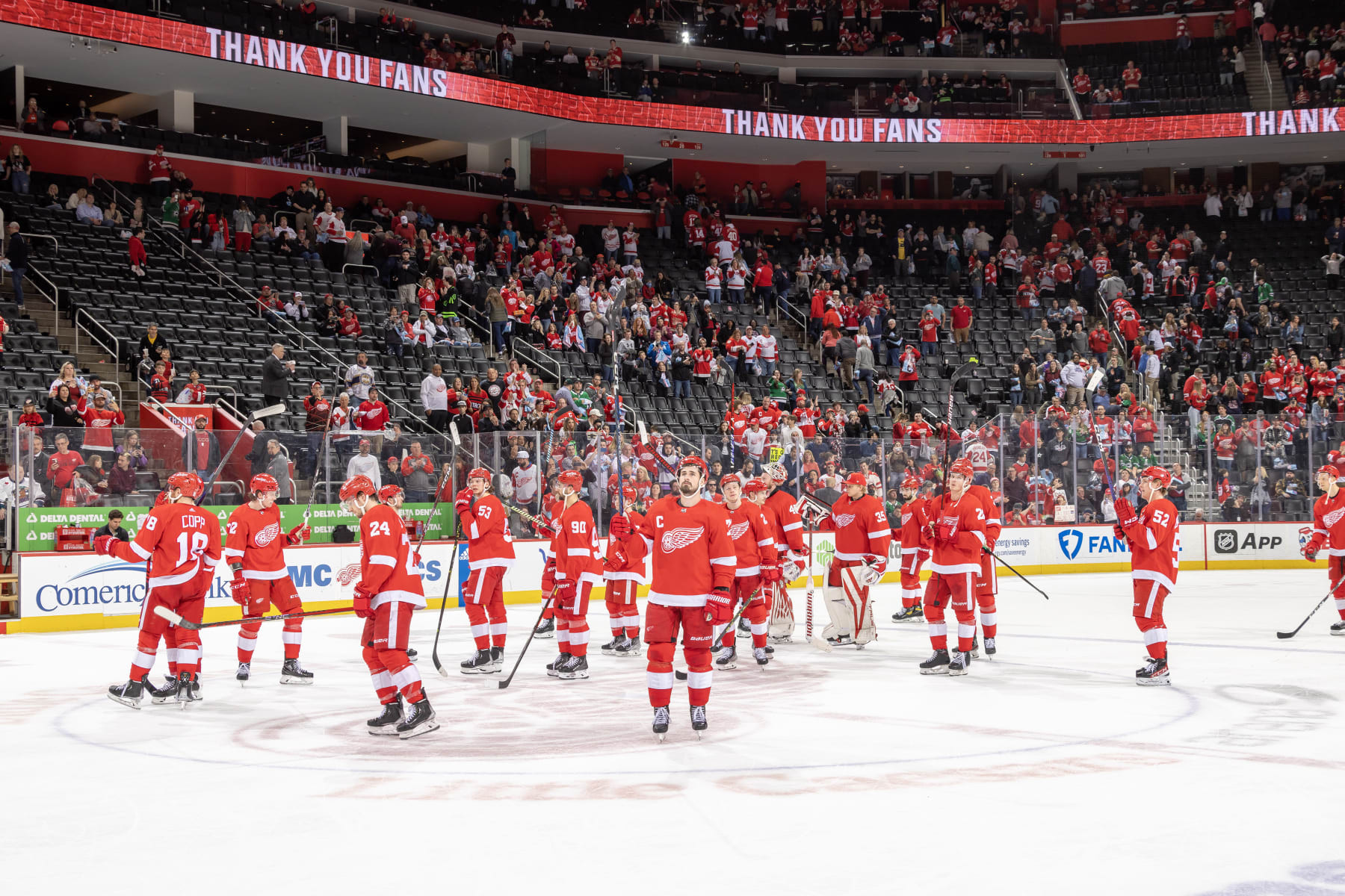 DETROIT, MI - APRIL 10: Dylan Larkin #71 of the Detroit Red Wings and teammates statue the fans after the last home game of the season against the Dallas Stars at Little Caesars Arena on April 10, 2023 in Detroit, Michigan. Dallas defeated Detroit 6-1. (Photo by Dave Reginek/NHLI via Getty Images)