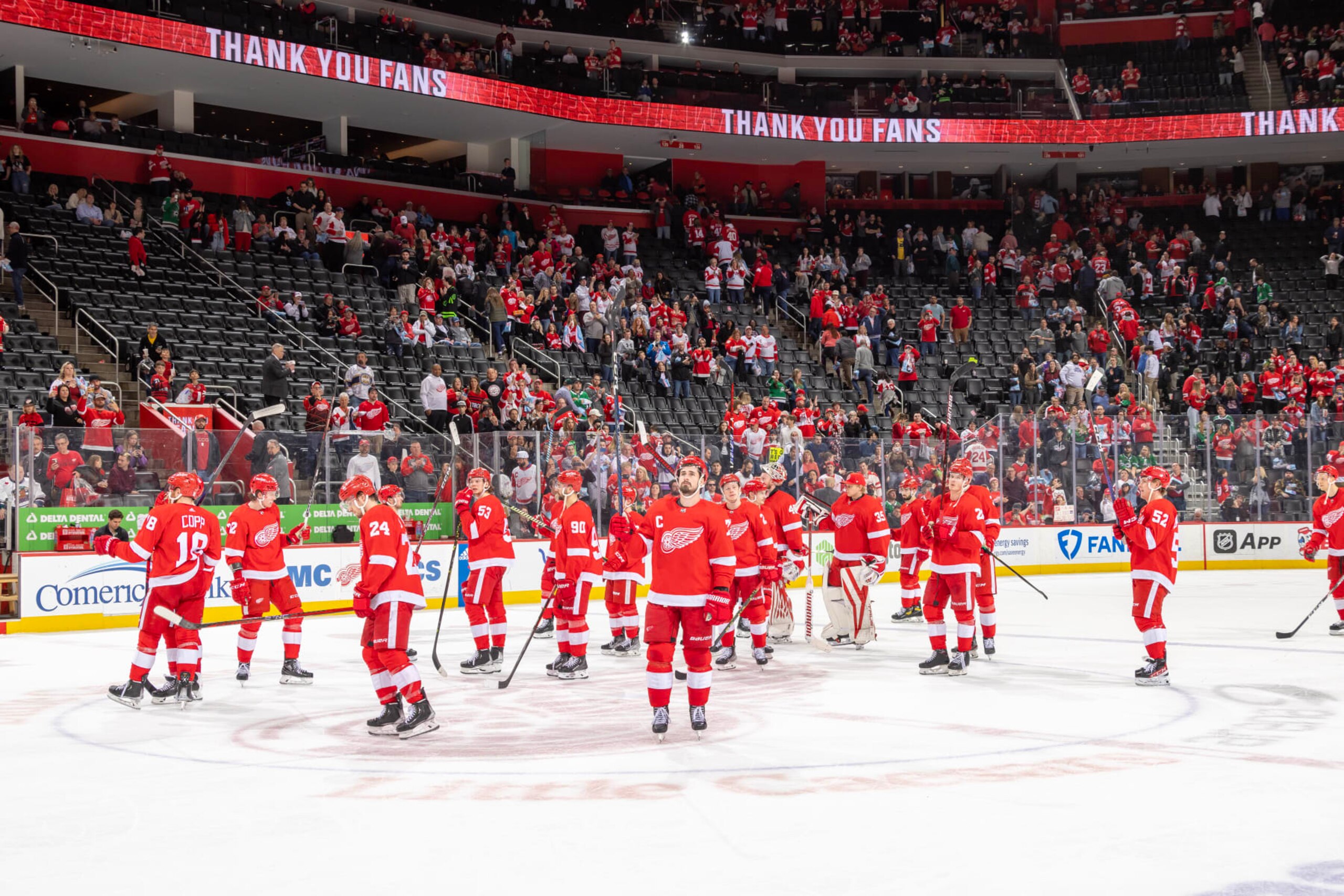 DETROIT, MI - APRIL 10: Dylan Larkin #71 of the Detroit Red Wings and teammates statue the fans after the last home game of the season against the Dallas Stars at Little Caesars Arena on April 10, 2023 in Detroit, Michigan. Dallas defeated Detroit 6-1. (Photo by Dave Reginek/NHLI via Getty Images)