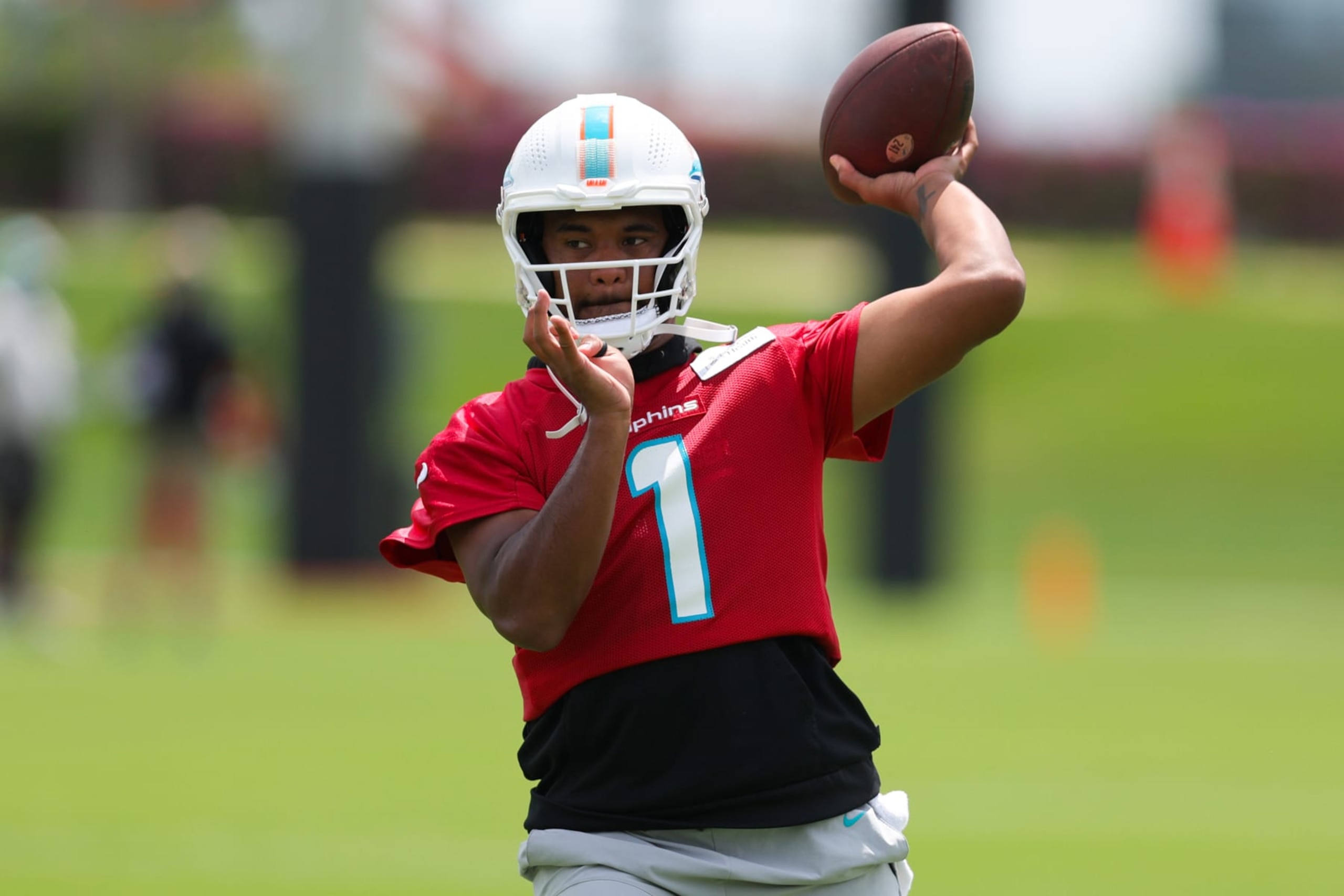 MIAMI GARDENS, FLORIDA - JUNE 08: Tua Tagovailoa #1 of the Miami Dolphins throws a pass during practice at Baptist Health Training Complex on June 08, 2023 in Miami Gardens, Florida. (Photo by Megan Briggs/Getty Images)
