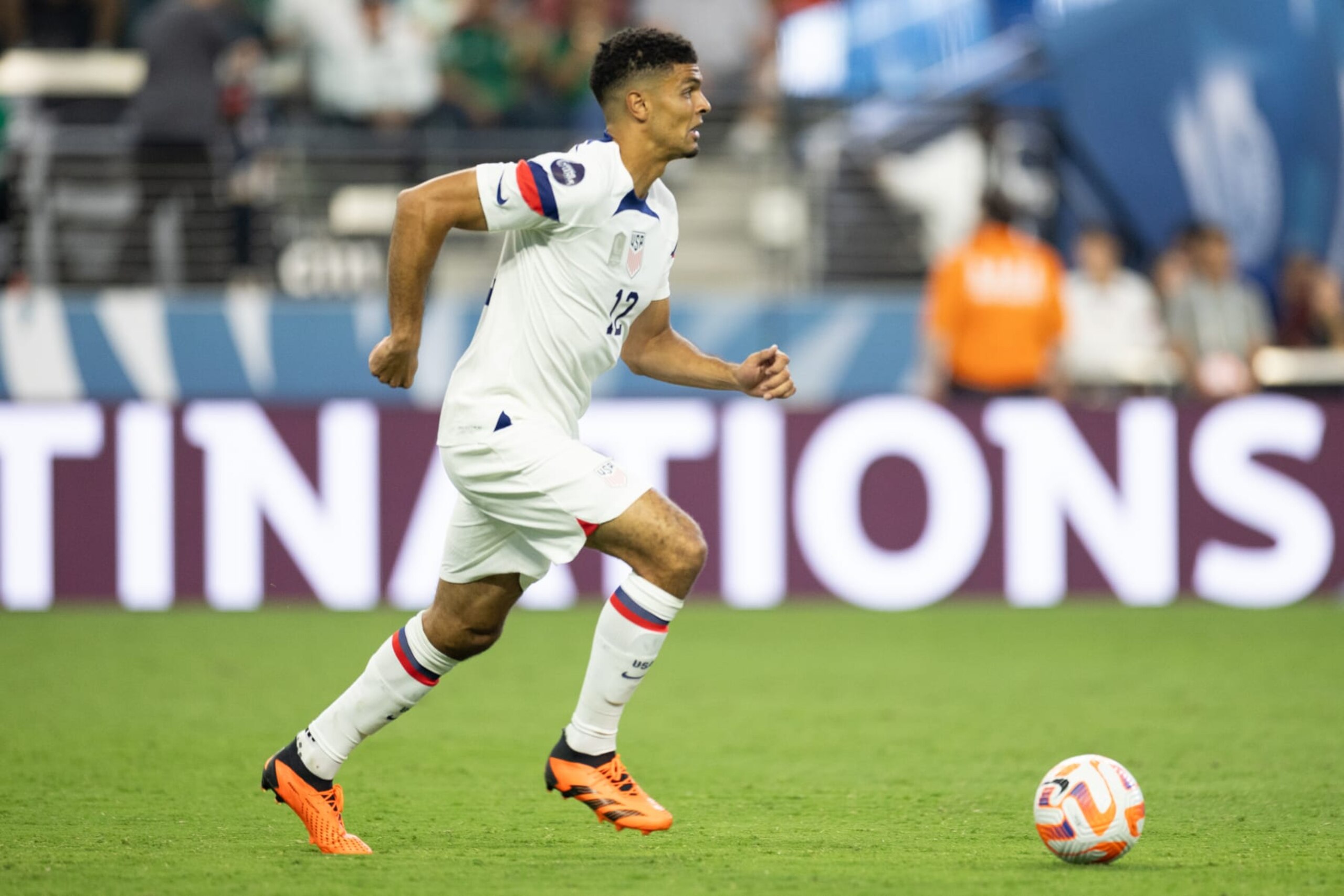 LAS VEGAS, NV - JUNE 15: Miles Robinson #12 of the United States moves with the ball during a game between Mexico and USMNT at  Allegiant Stadium  on June 15, 2023 in  Las Vegas, Nevada. (Photo by John Dorton/USSF/Getty Images for USSF)