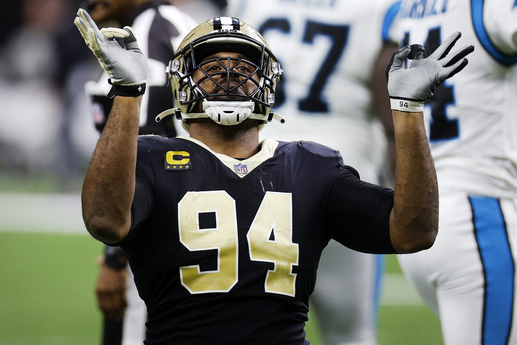 NEW ORLEANS, LOUISIANA - JANUARY 02: Cameron Jordan #94 of the New Orleans Saints reacts after making a sack in the fourth quarter of the game against the Carolina Panthers at Caesars Superdome on January 02, 2022 in New Orleans, Louisiana. (Photo by Chris Graythen/Getty Images)