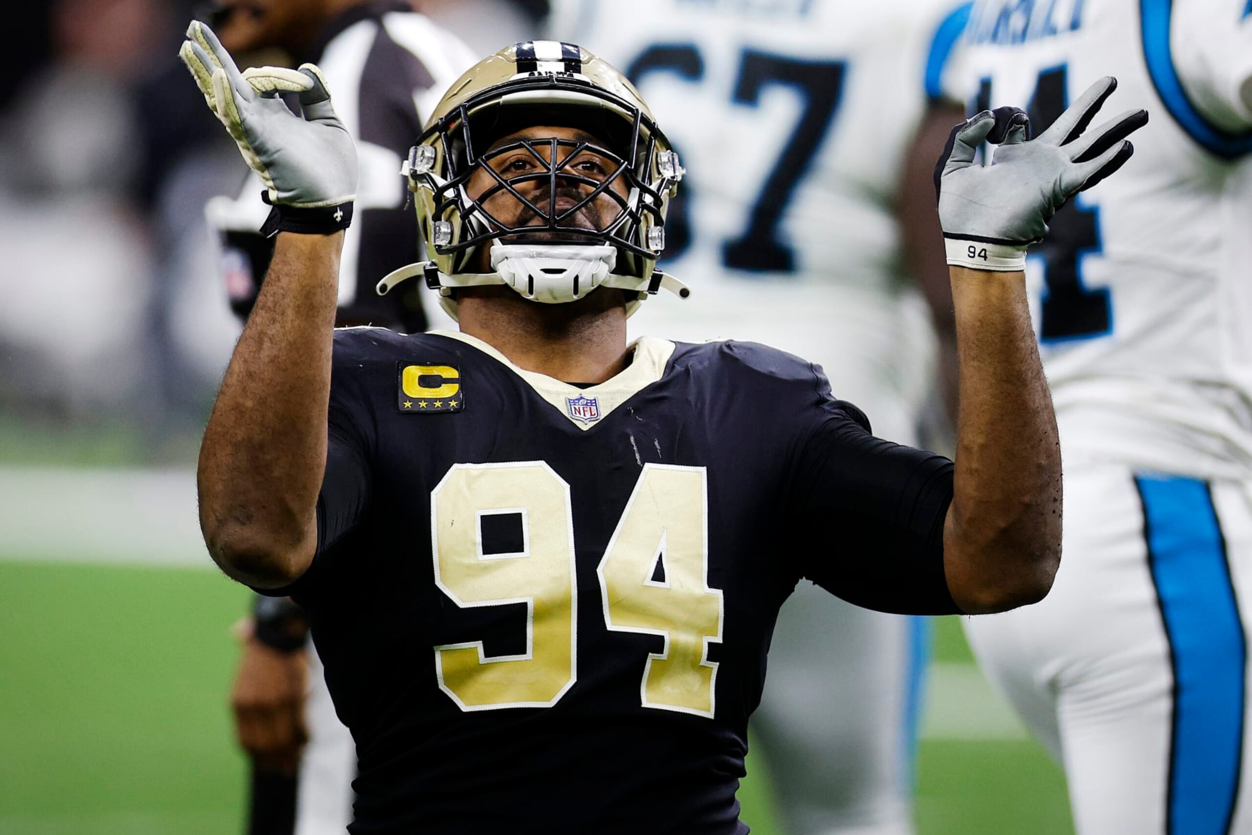 NEW ORLEANS, LOUISIANA - JANUARY 02: Cameron Jordan #94 of the New Orleans Saints reacts after making a sack in the fourth quarter of the game against the Carolina Panthers at Caesars Superdome on January 02, 2022 in New Orleans, Louisiana. (Photo by Chris Graythen/Getty Images)