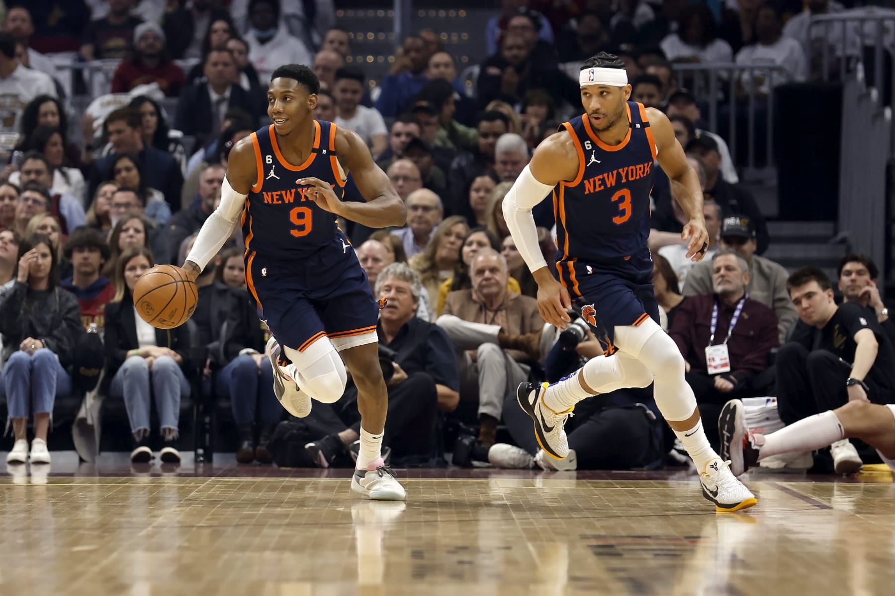 CLEVELAND, OH - APRIL 26:  RJ Barrett #9 of the New York Knicks and Josh Hart #3 run up the court during Game Five of the Eastern Conference First Round Playoffs against the Cleveland Cavaliers at Rocket Mortgage Fieldhouse on April 26, 2023 in Cleveland, Ohio. NOTE TO USER: User expressly acknowledges and agrees that, by downloading and or using this photograph, User is consenting to the terms and conditions of the Getty Images License Agreement. (Photo by Kirk Irwin/Getty Images)
