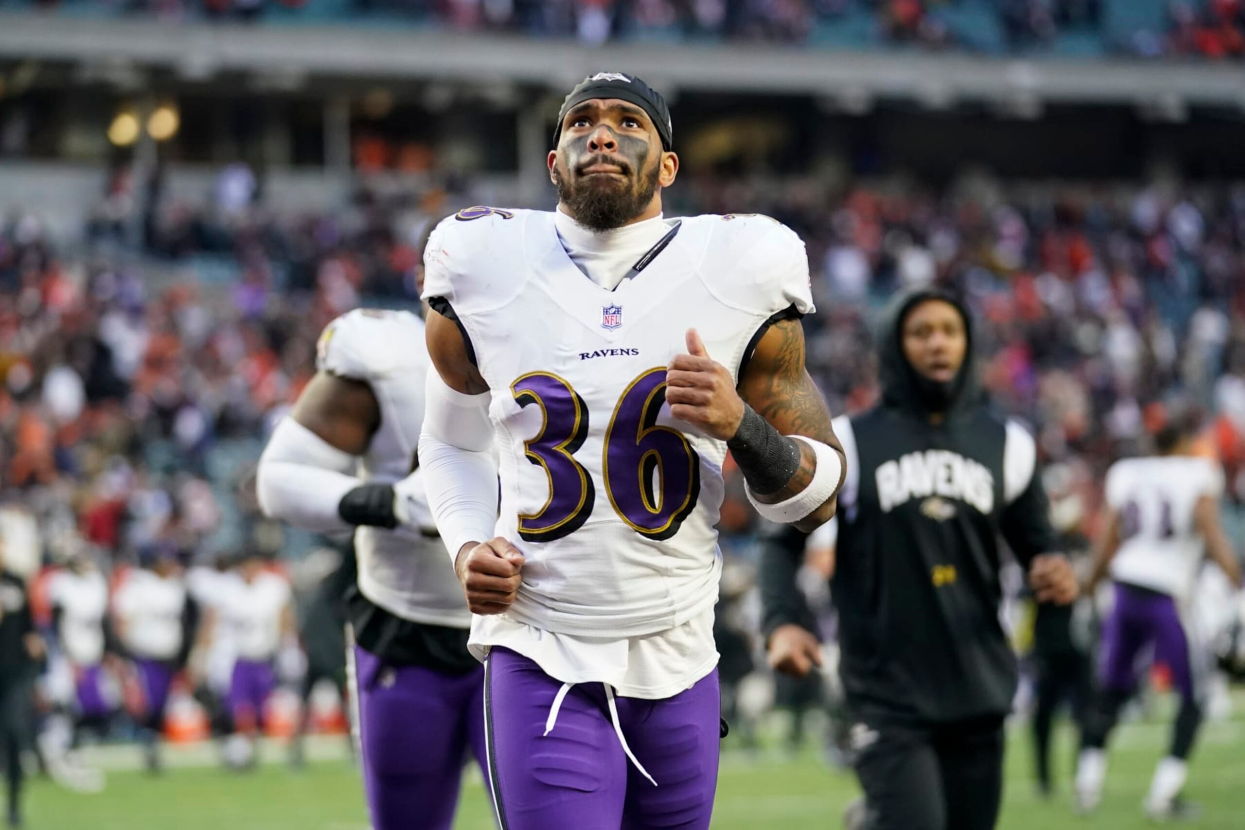 FILE - Baltimore Ravens safety Chuck Clark (36) runs off the field following an NFL football game against the Cincinnati Bengals, Sunday, Jan. 8, 2023, in Cincinnati. The New York Jets are acquiring veteran safety Chuck Clark from the Baltimore Ravens, according to a person with knowledge of the trade. New York agreed Thursday, March 9, to send a seventh-round draft pick in 2024 to Baltimore, the person told The Associated Press on condition of anonymity because teams can't announce trades until the NFL's new year begins next Wednesday. (AP Photo/Joshua A. Bickel, File)