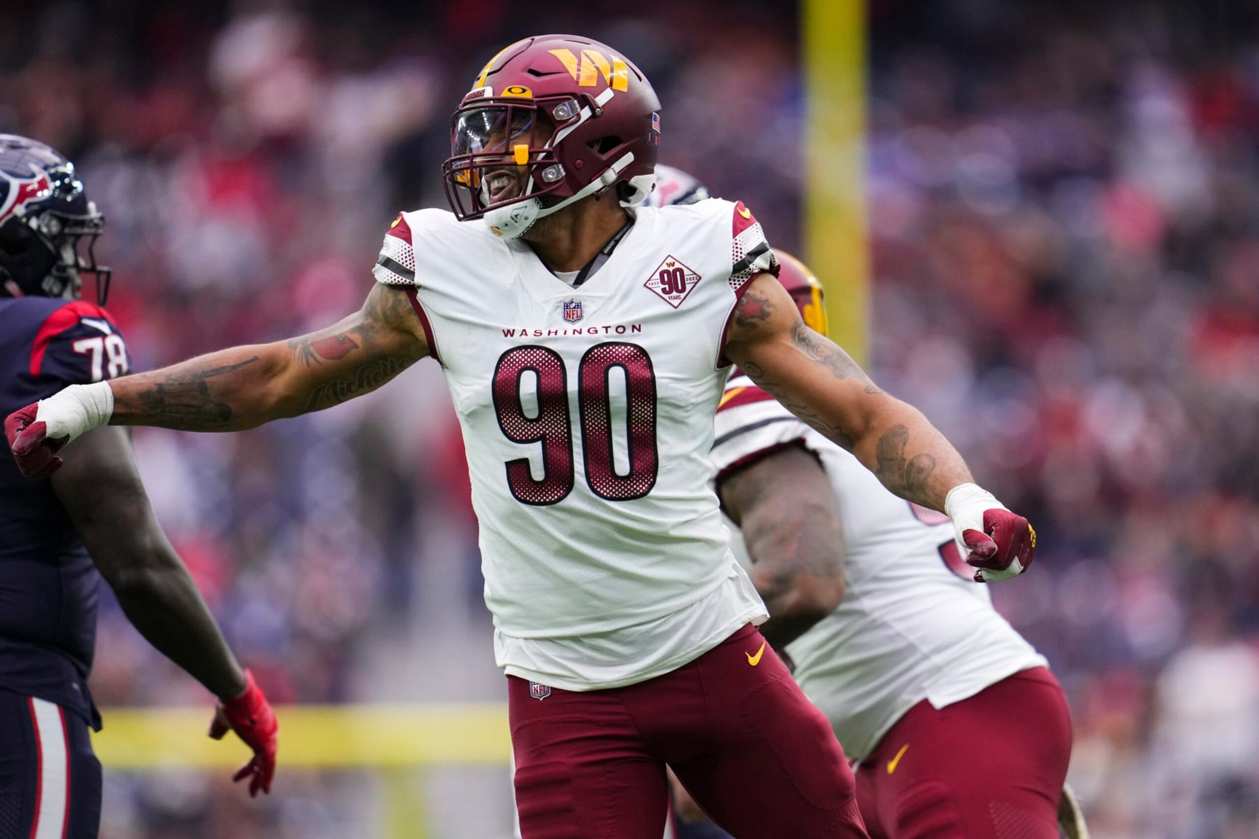 HOUSTON, TX - NOVEMBER 20: Montez Sweat #90 of the Washington Commanders celebrates against the Houston Texans at NRG Stadium on November 20, 2022 in Houston, Texas. (Photo by Cooper Neill/Getty Images)