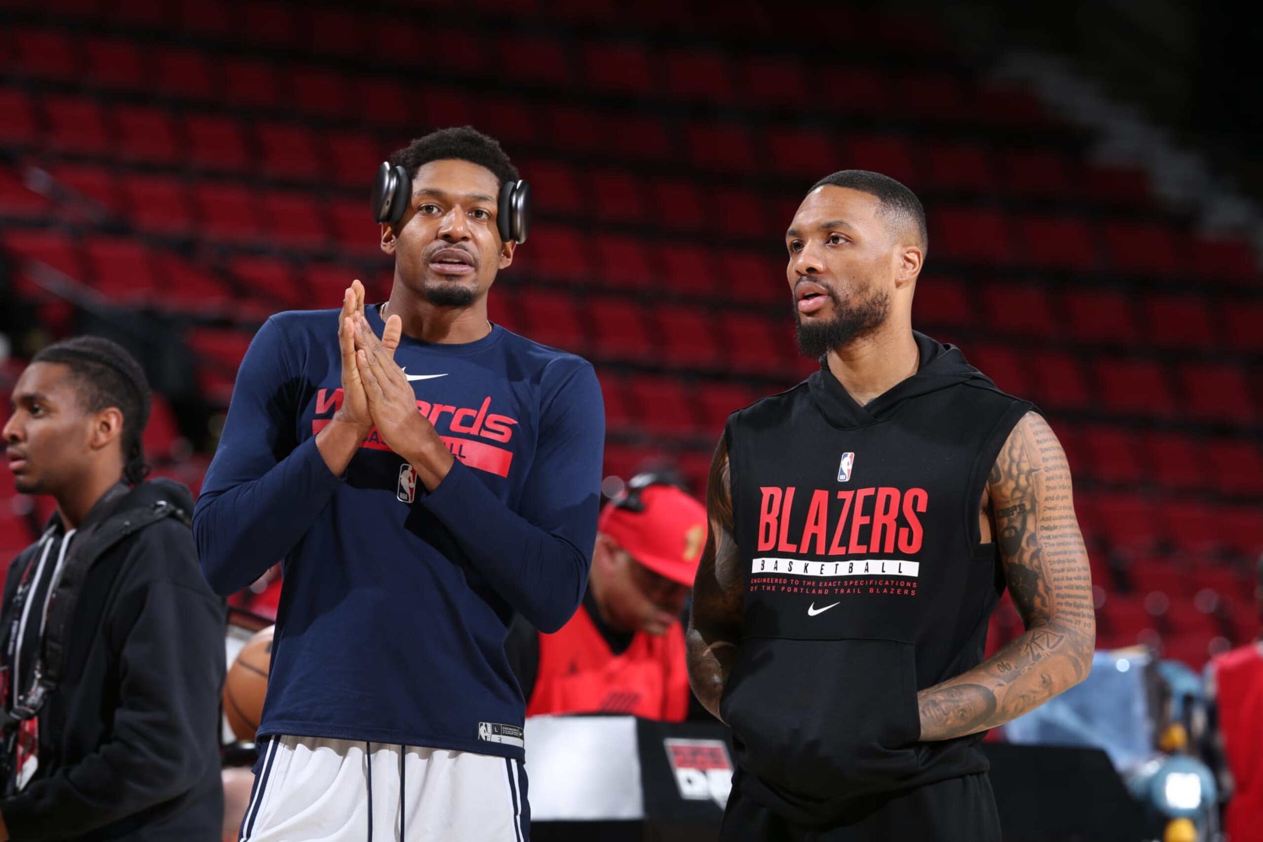 PORTLAND, OR - FEBRUARY 14:  Damian Lillard #0 of the Portland Trail Blazers and Bradley Beal #3 of the Washington Wizards looks on before the game on February 14, 2023 at the Moda Center Arena in Portland, Oregon. NOTE TO USER: User expressly acknowledges and agrees that, by downloading and or using this photograph, user is consenting to the terms and conditions of the Getty Images License Agreement. Mandatory Copyright Notice: Copyright 2023 NBAE (Photo by Sam Forencich/NBAE via Getty Images)