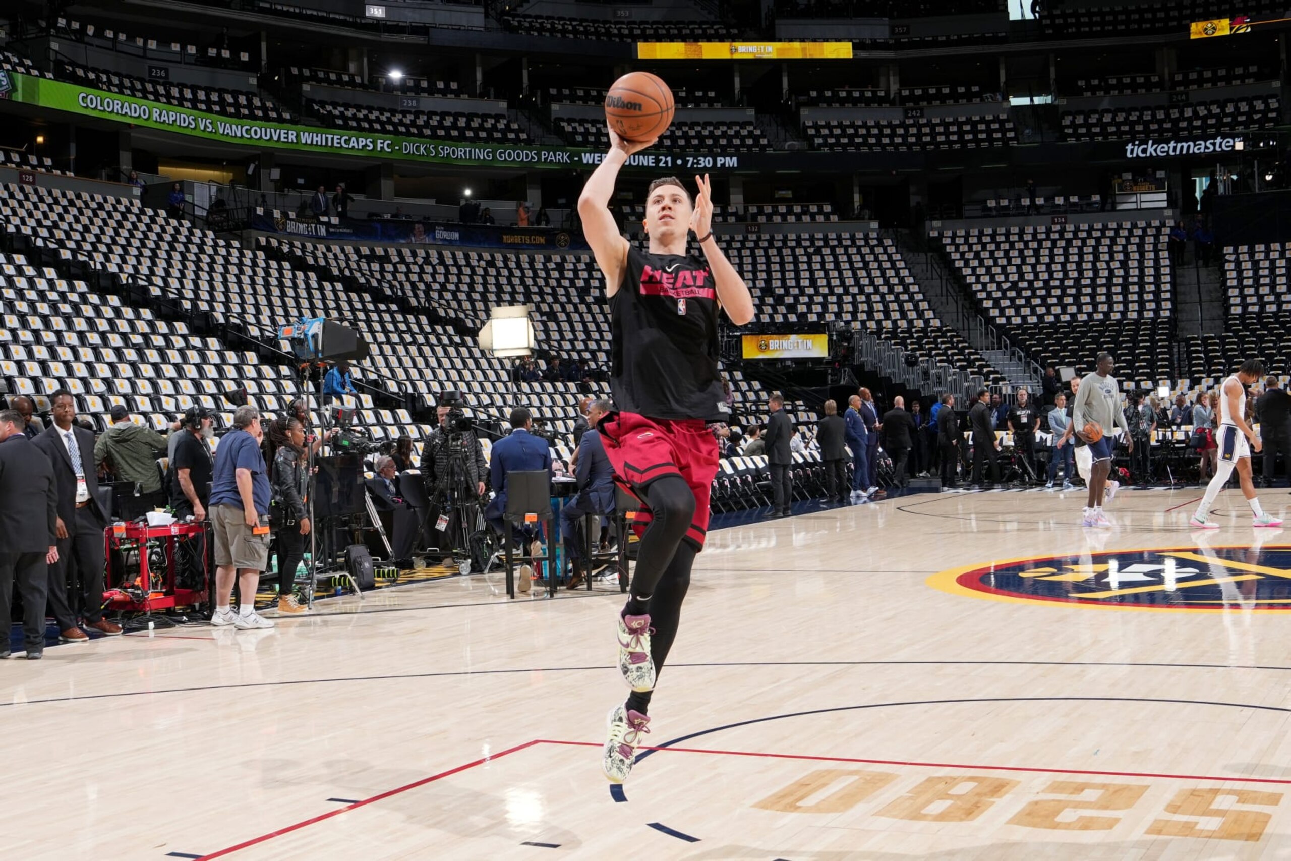 DENVER, CO - JUNE 12: Duncan Robinson #55 of the Miami Heat warms up before Game Five of the 2023 NBA Finals against the Denver Nuggets on June 12, 2023 at Ball Arena in Denver, Colorado. NOTE TO USER: User expressly acknowledges and agrees that, by downloading and or using this Photograph, user is consenting to the terms and conditions of the Getty Images License Agreement. Mandatory Copyright Notice: Copyright 2023 NBAE (Photo by Jesse D. Garrabrant/NBAE via Getty Images)