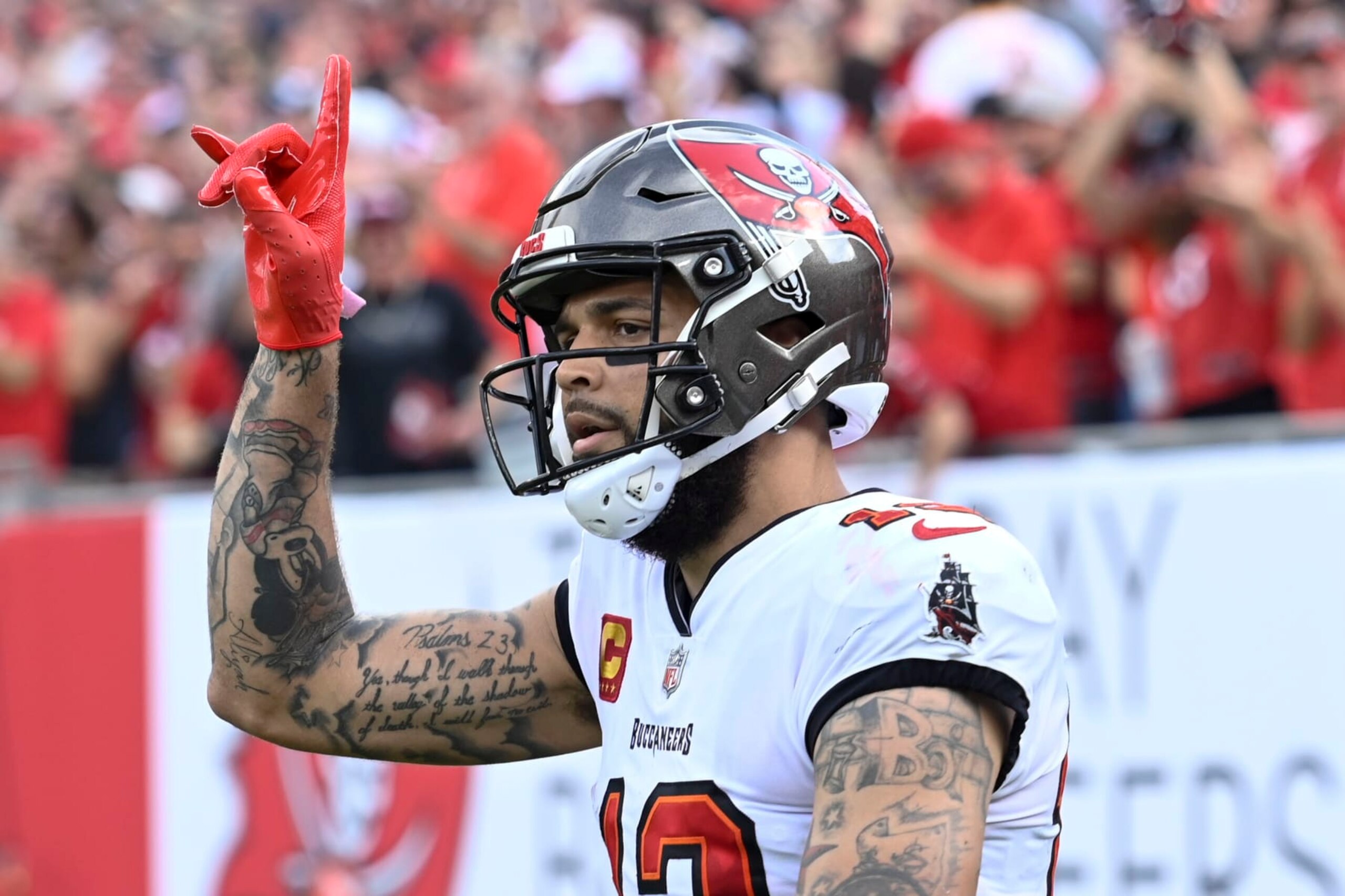 Tampa Bay Buccaneers wide receiver Mike Evans celebrates after scoring during the first half of an NFL football game between the Carolina Panthers and the Tampa Bay Buccaneers on Sunday, Jan. 1, 2023, in Tampa, Fla. (AP Photo/Jason Behnken) Tampa Bay Buccaneers wide receiver Mike Evans celebrates after scoring during the first half of an NFL football game between the Carolina Panthers and the Tampa Bay Buccaneers on Sunday, Jan. 1, 2023, in Tampa, Fla. (AP Photo/Jason Behnken)