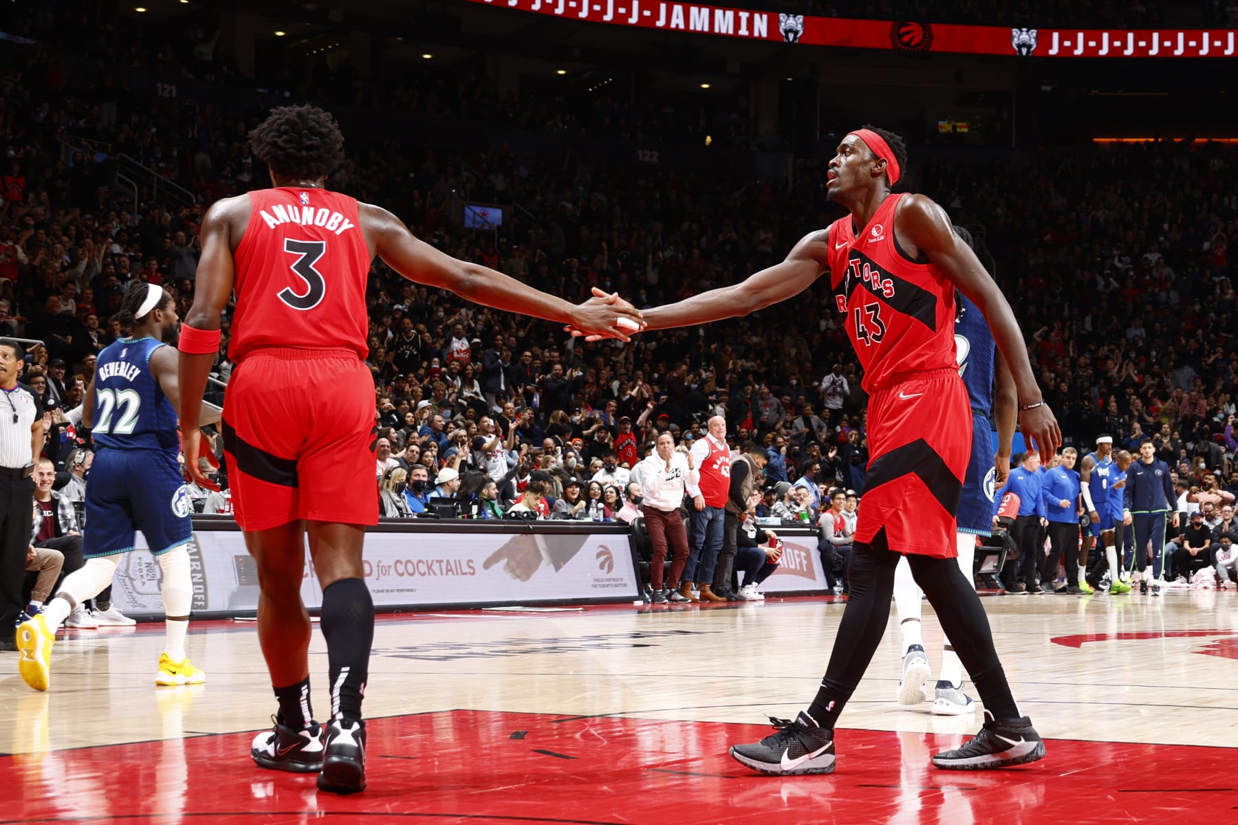 TORONTO, CANADA - MARCH 30: OG Anunoby #3 hi-fives Pascal Siakam #43 of the Toronto Raptors during the game against the Minnesota Timberwolves on March 30, 2022 at the Scotiabank Arena in Toronto, Ontario, Canada.  NOTE TO USER: User expressly acknowledges and agrees that, by downloading and or using this Photograph, user is consenting to the terms and conditions of the Getty Images License Agreement.  Mandatory Copyright Notice: Copyright 2022 NBAE (Photo by Vaughn Ridley/NBAE via Getty Images)