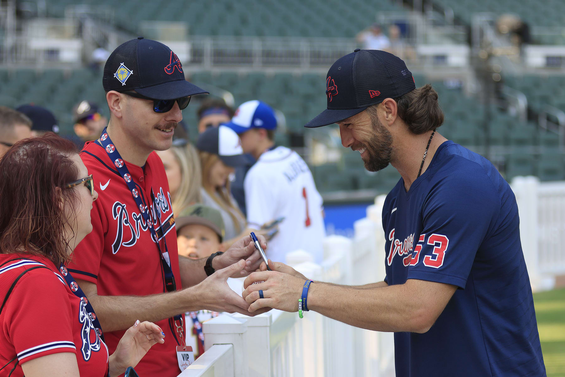 ATLANTA, GA - JUNE 09: Atlanta Braves third baseman Charlie Culberson (53) signs an autograph for a fan heading into the Friday evening MLB game between the Atlanta Braves and the Washington Nationals on June 9, 2023 at Truist Park in Atlanta, Georgia.  (Photo by David J. Griffin/Icon Sportswire via Getty Images)