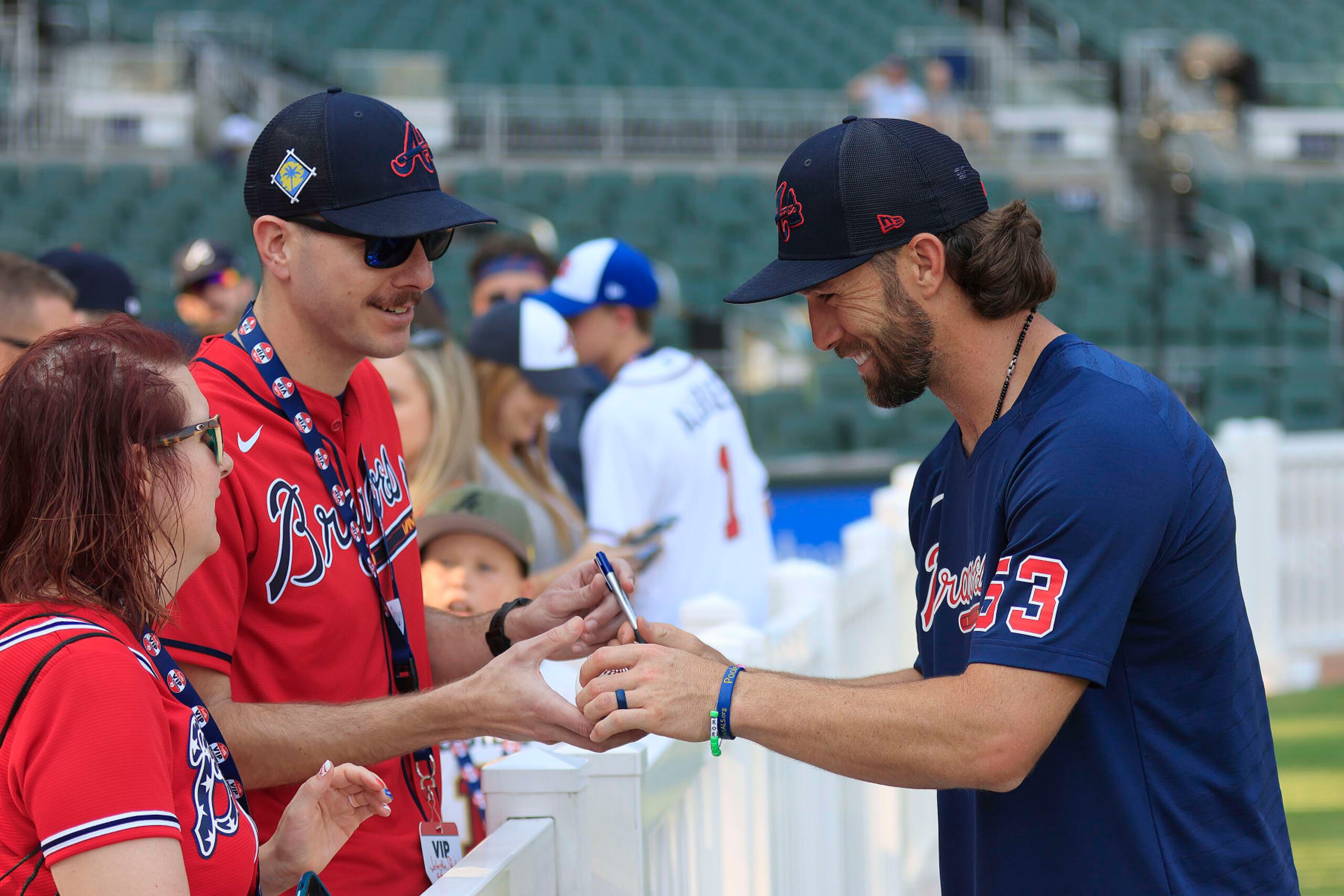 ATLANTA, GA - JUNE 09: Atlanta Braves third baseman Charlie Culberson (53) signs an autograph for a fan heading into the Friday evening MLB game between the Atlanta Braves and the Washington Nationals on June 9, 2023 at Truist Park in Atlanta, Georgia.  (Photo by David J. Griffin/Icon Sportswire via Getty Images)