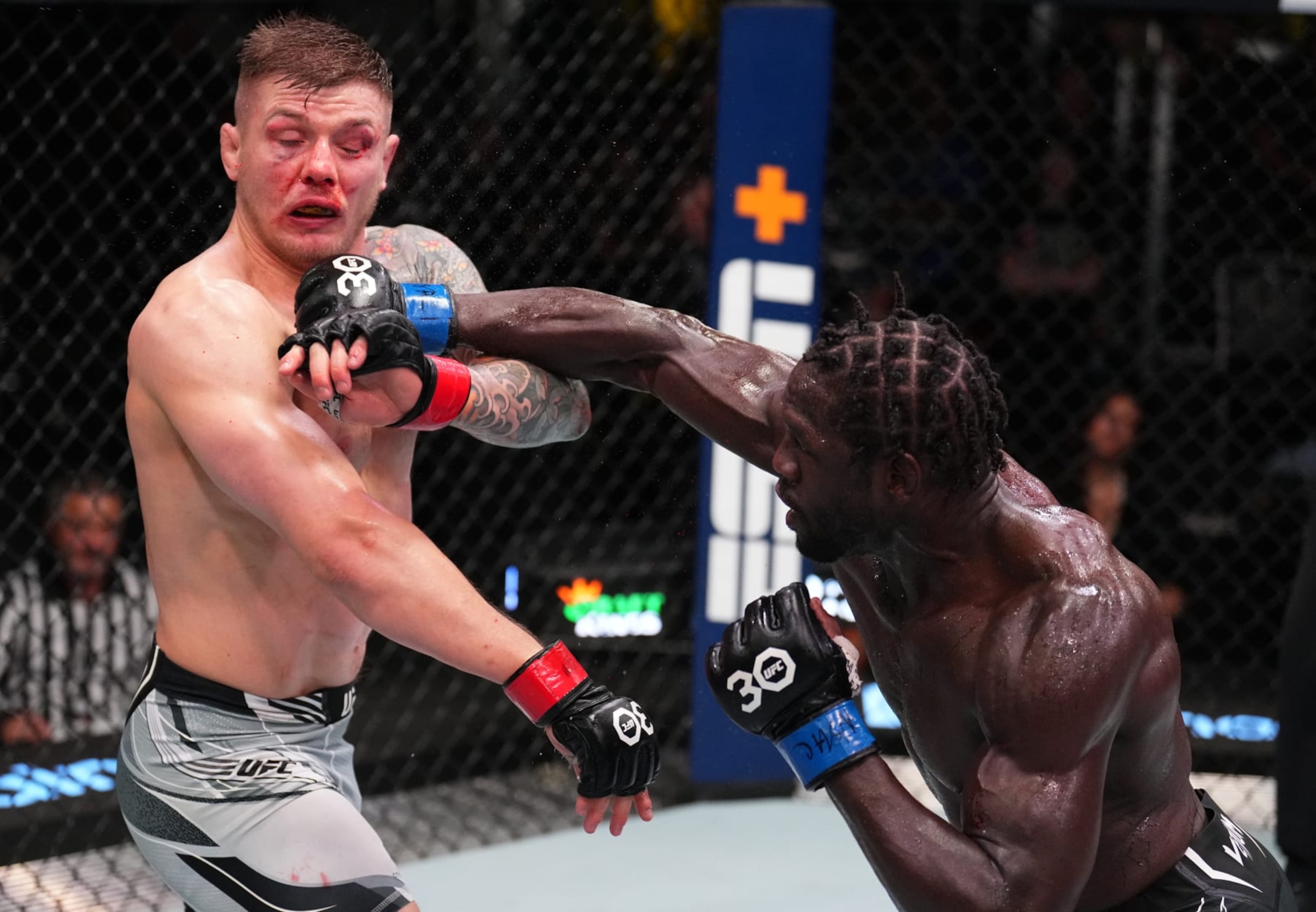 LAS VEGAS, NEVADA - JUNE 17: (R-L) Jared Cannonier punches Marvin Vettori of Italy in a middleweight fight during the UFC Fight Night event at UFC APEX on June 17, 2023 in Las Vegas, Nevada. (Photo by Chris Unger/Zuffa LLC via Getty Images)