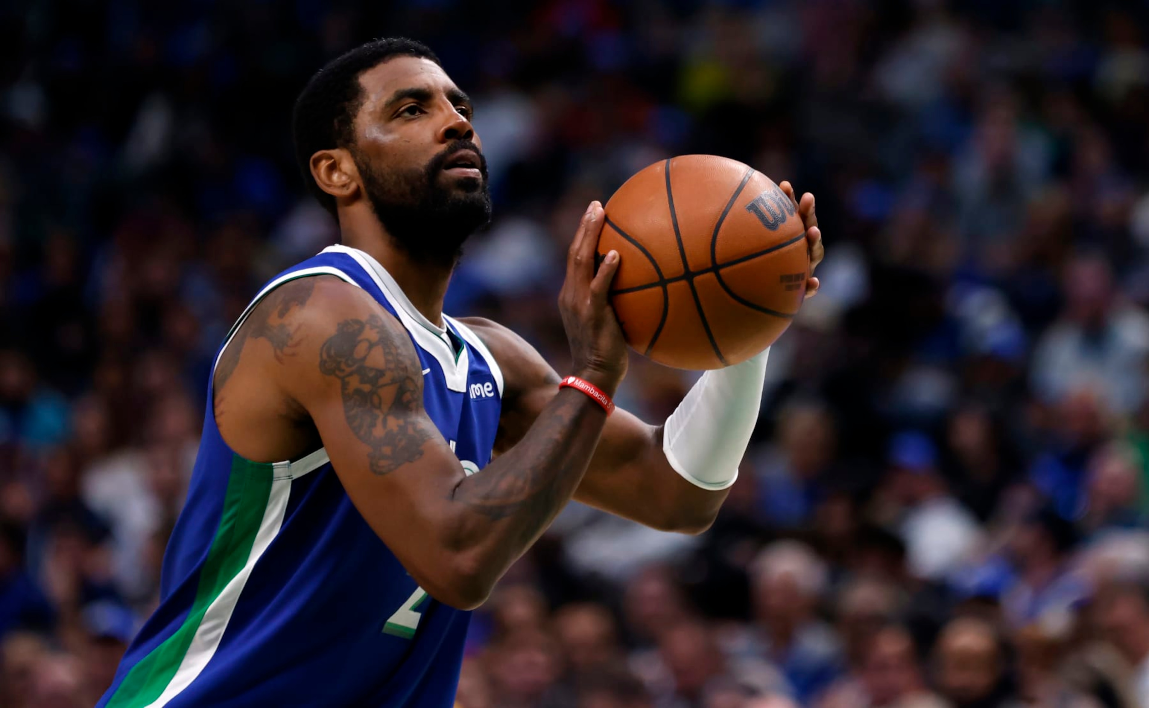 DALLAS, TX - APRIL 5: Kyrie Irving #2 of the Dallas Mavericks shoots the ball against the Sacramento Kings in the second half at American Airlines Center on April 5, 2023 in Dallas, Texas. The Mavericks won 123-119. NOTE TO USER: User expressly acknowledges and agrees that, by downloading and or using this photograph, User is consenting to the terms and conditions of the Getty Images License Agreement. (Photo by Ron Jenkins/Getty Images)