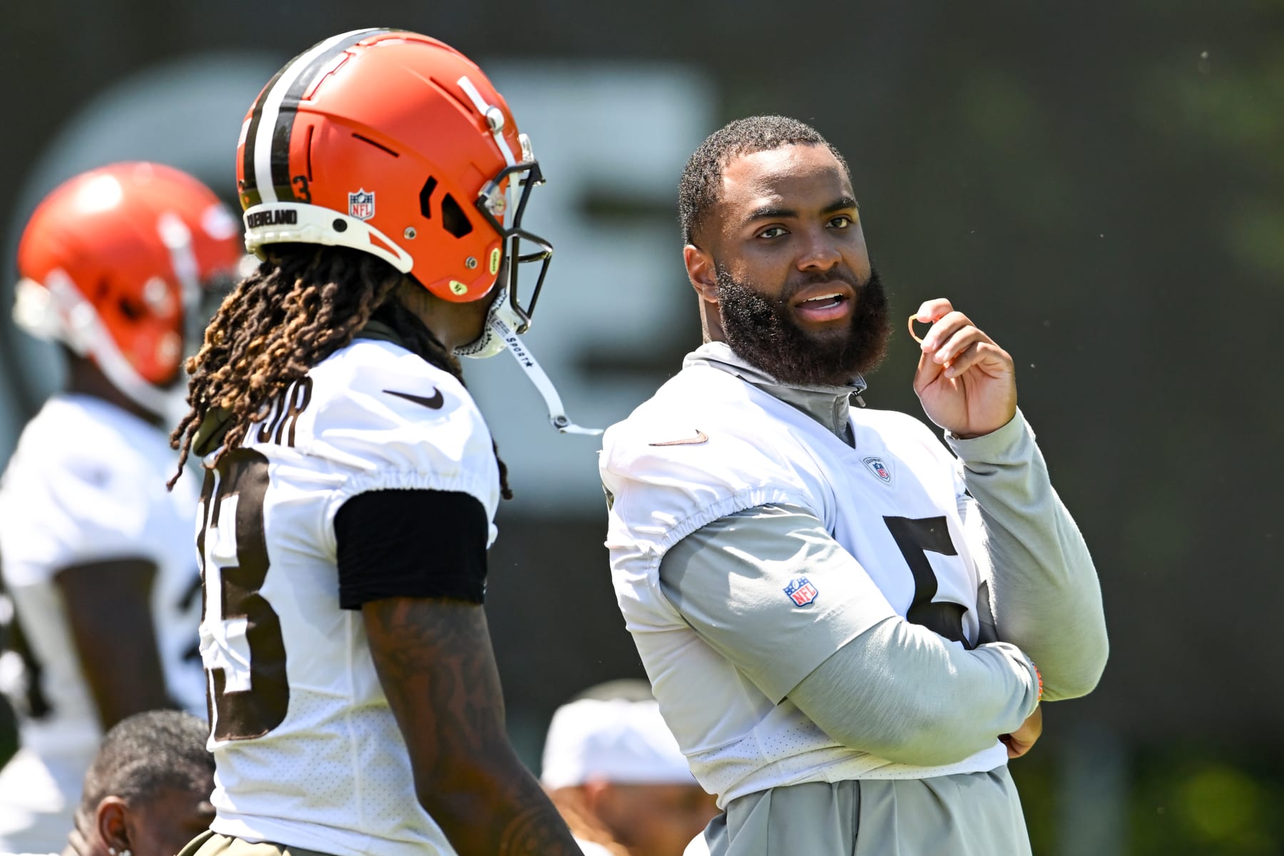 BEREA, OHIO - MAY 31: Anthony Walker Jr. #5 of the Cleveland Browns talks with Martin Emerson Jr. #23 during the Cleveland Browns OTAs at CrossCountry Mortgage Campus on May 31, 2023 in Berea, Ohio. (Photo by Nick Cammett/Diamond Images via Getty Images)
