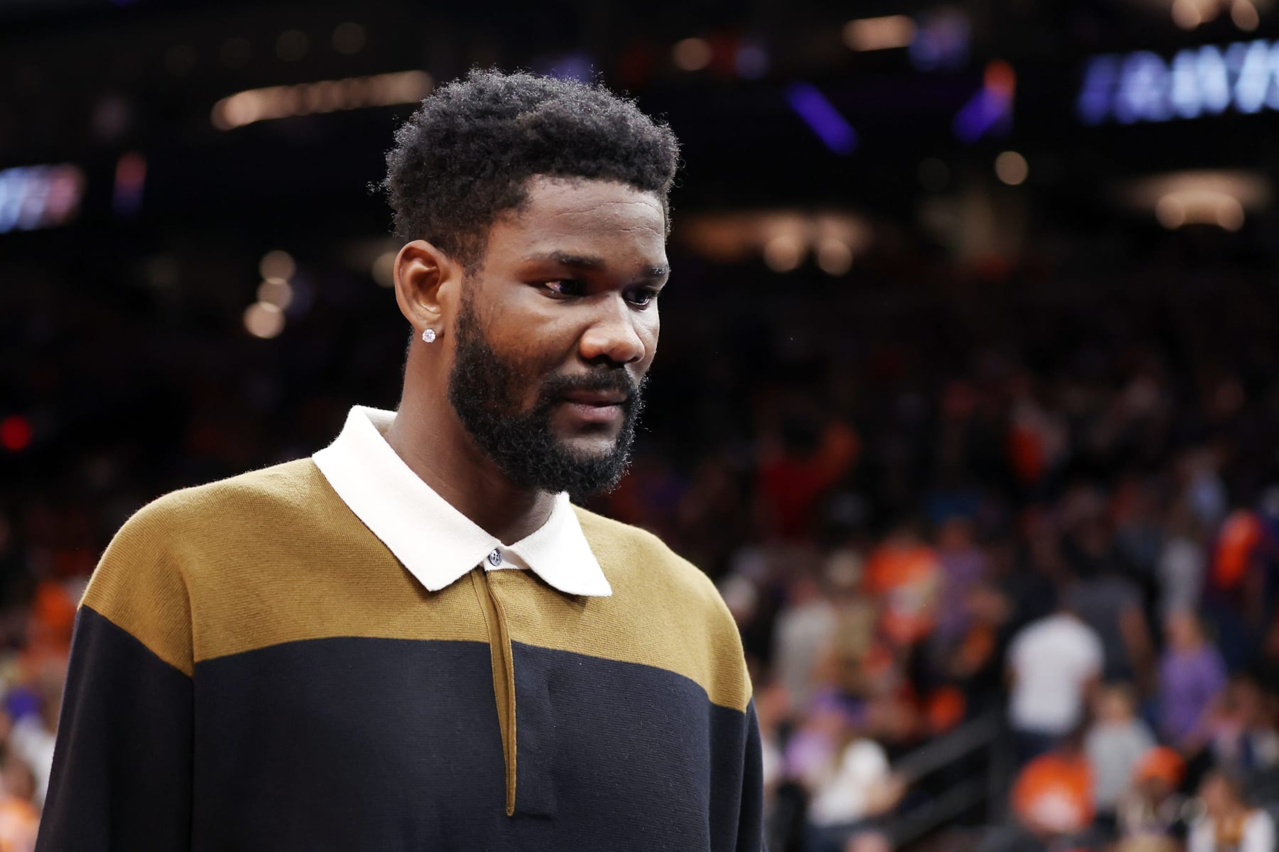 PHOENIX, ARIZONA - MAY 11: Deandre Ayton #22 of the Phoenix Suns looks on after the second quarter in game six of the Western Conference Semifinal Playoffs against the Denver Nuggets at Footprint Center on May 11, 2023 in Phoenix, Arizona. NOTE TO USER: User expressly acknowledges and agrees that, by downloading and or using this photograph, User is consenting to the terms and conditions of the Getty Images License Agreement. (Photo by Christian Petersen/Getty Images) PHOENIX, ARIZONA - MAY 11: Deandre Ayton #22 of the Phoenix Suns looks on after the second quarter in game six of the Western Conference Semifinal Playoffs against the Denver Nuggets at Footprint Center on May 11, 2023 in Phoenix, Arizona. NOTE TO USER: User expressly acknowledges and agrees that, by downloading and or using this photograph, User is consenting to the terms and conditions of the Getty Images License Agreement. (Photo by Christian Petersen/Getty Images)