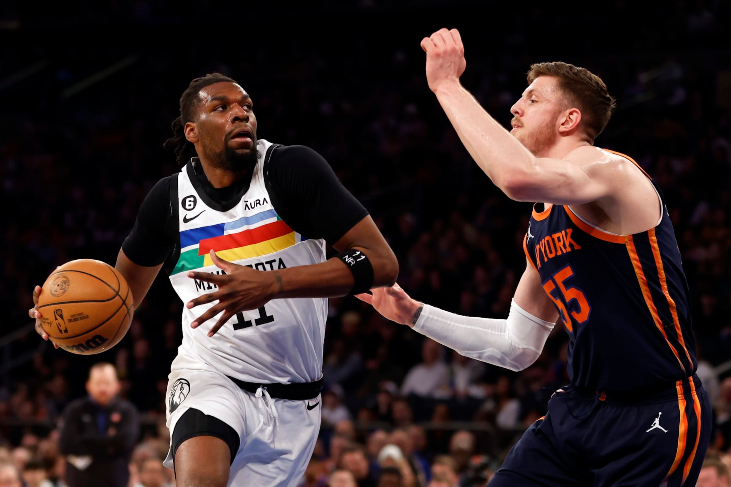 NEW YORK, NEW YORK - MARCH 20: Naz Reid #11 of the Minnesota Timberwolves dribbles against Isaiah Hartenstein #55 of the New York Knicks during the first half at Madison Square Garden on March 20, 2023 in New York City. NOTE TO USER: User expressly acknowledges and agrees that, by downloading and/or using this photograph, User is consenting to the terms and conditions of the Getty Images License Agreement. (Photo by Sarah Stier/Getty Images) NEW YORK, NEW YORK - MARCH 20: Naz Reid #11 of the Minnesota Timberwolves dribbles against Isaiah Hartenstein #55 of the New York Knicks during the first half at Madison Square Garden on March 20, 2023 in New York City. NOTE TO USER: User expressly acknowledges and agrees that, by downloading and/or using this photograph, User is consenting to the terms and conditions of the Getty Images License Agreement. (Photo by Sarah Stier/Getty Images)