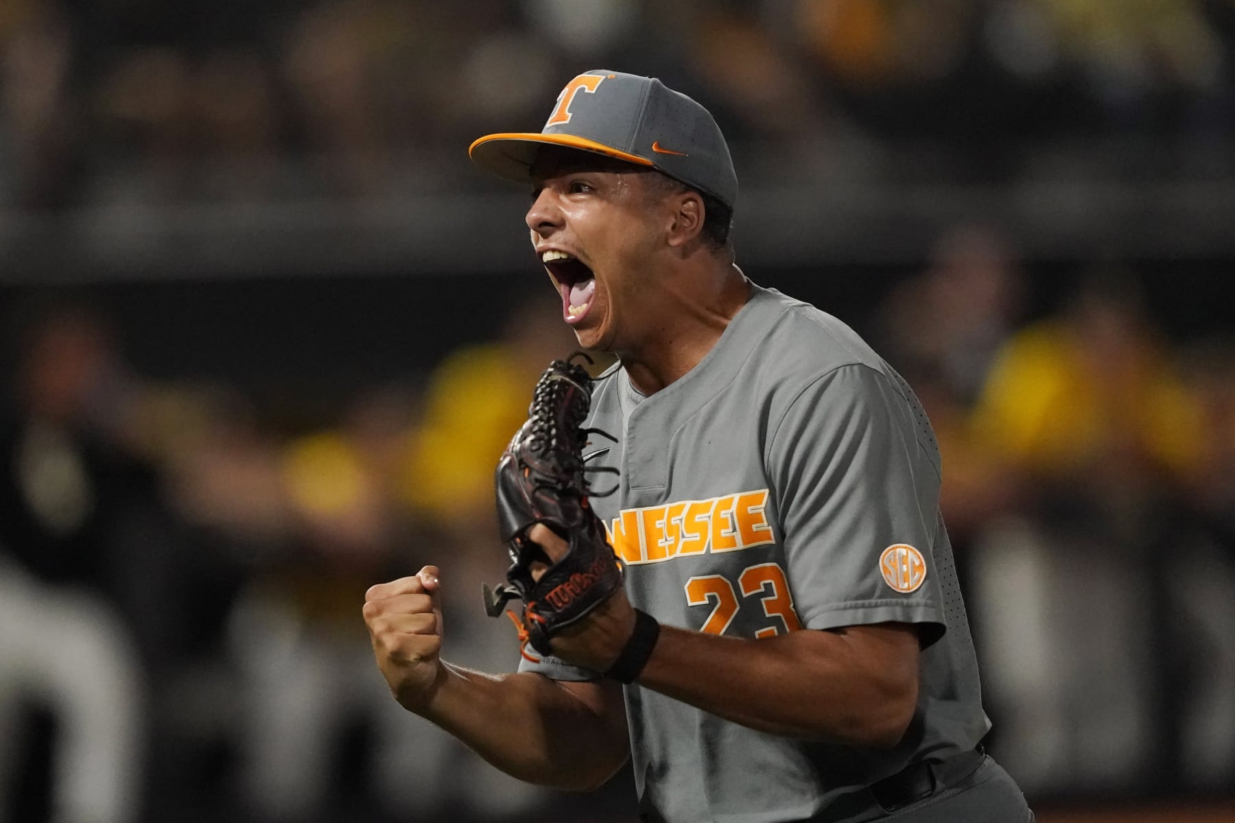 Tennessee pitcher Chase Burns (23) reacts after striking out two Southern Mississippi baseball players to close out the seventh inning of an NCAA college baseball tournament super regional game Monday, June 12, 2023, in Hattiesburg, Miss. Tennessee won 5-0 and advances to the College World Series. (AP Photo/Rogelio V. Solis)