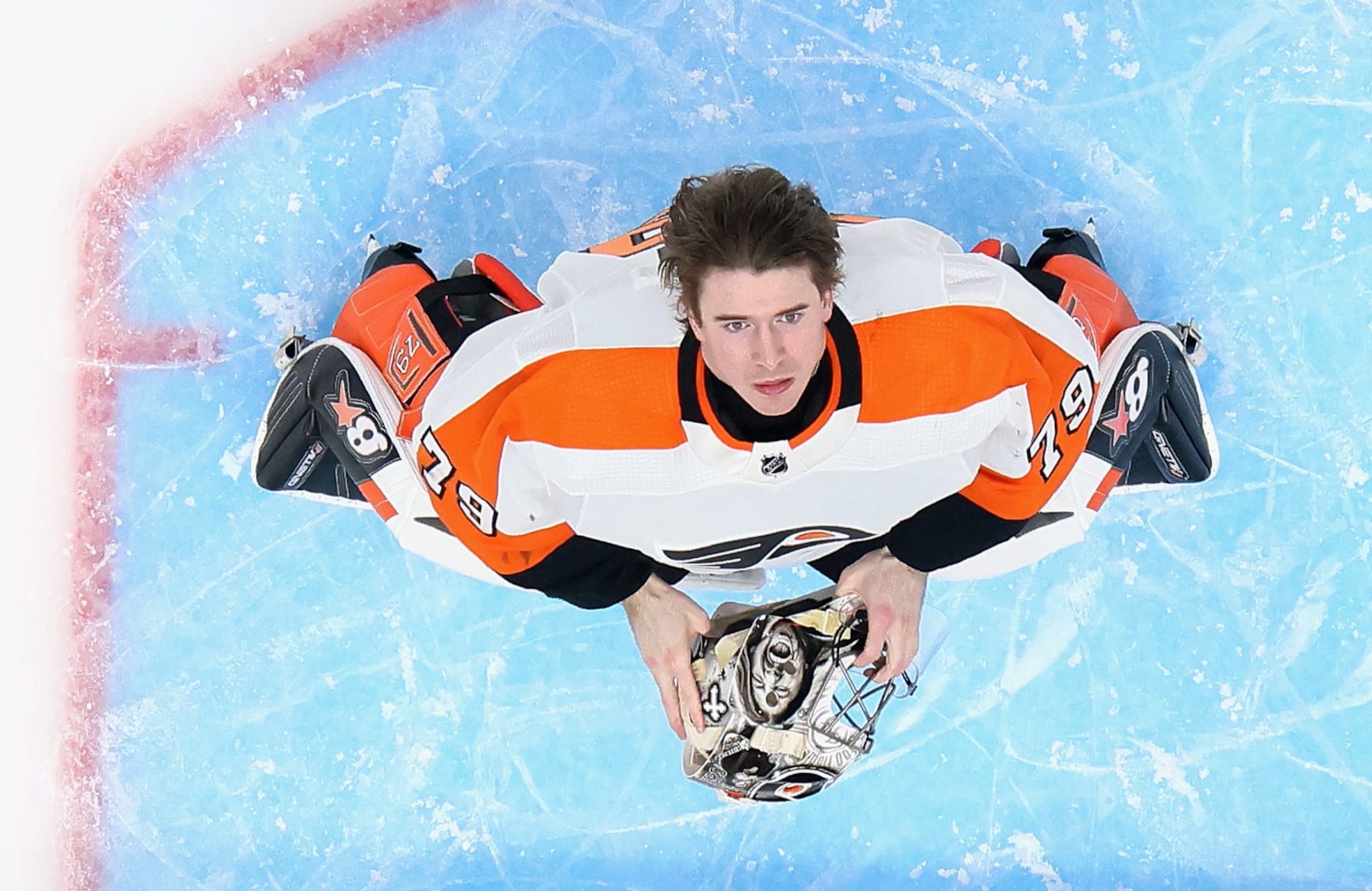 ELMONT, NEW YORK - APRIL 08: Carter Hart #79 of the Philadelphia Flyers prepares to play against the New York Islanders at the UBS Arena on April 08, 2023 in Elmont, New York. The Islanders shut out the Flyers 4-0. (Photo by Bruce Bennett/Getty Images)