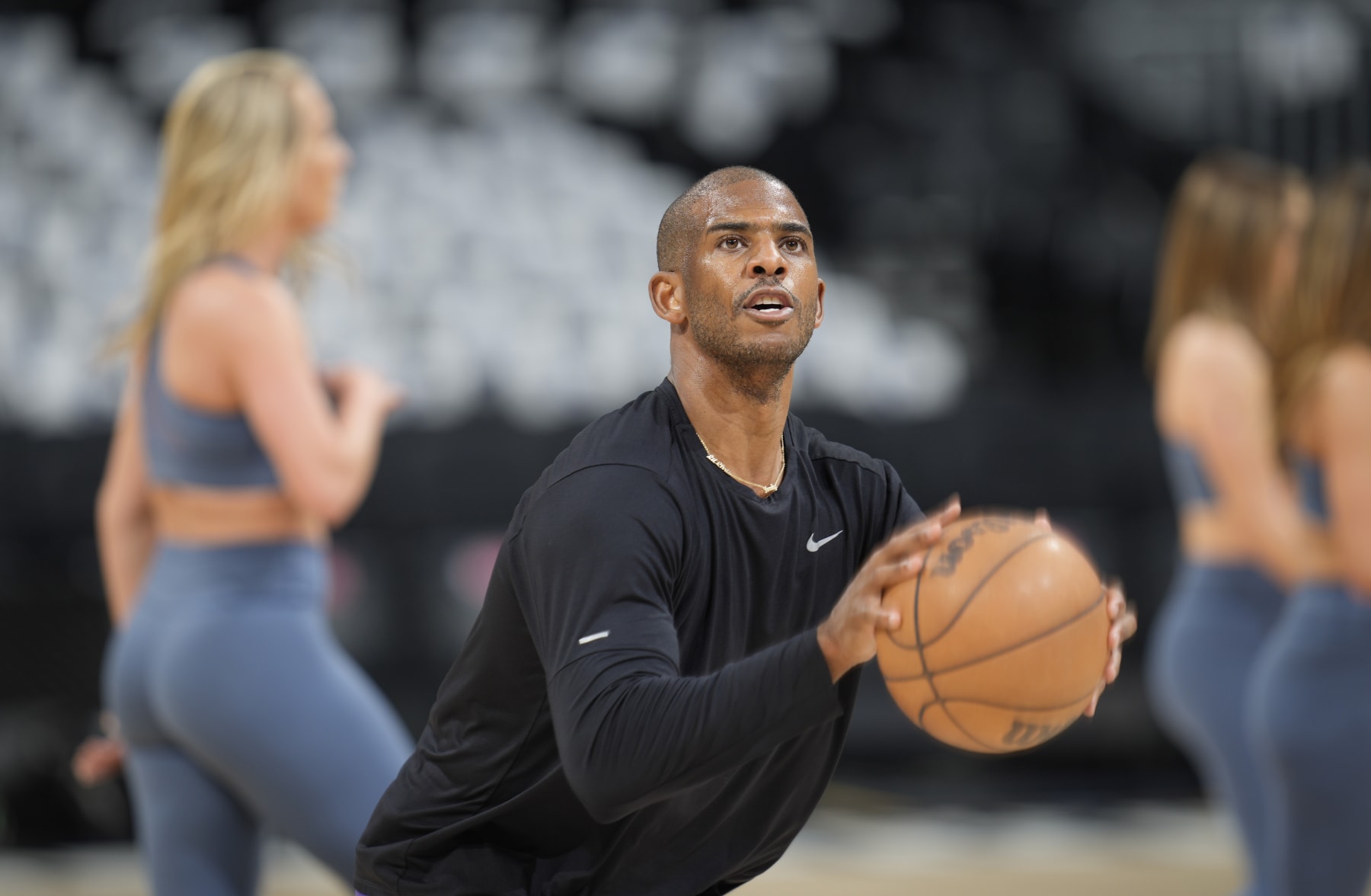 Phoenix Suns guard Chris Paul warms up before Game 5 of an NBA basketball second-round playoff series against the Denver Nuggets Tuesday, May 9, 2023, in Denver. (AP Photo/David Zalubowski)