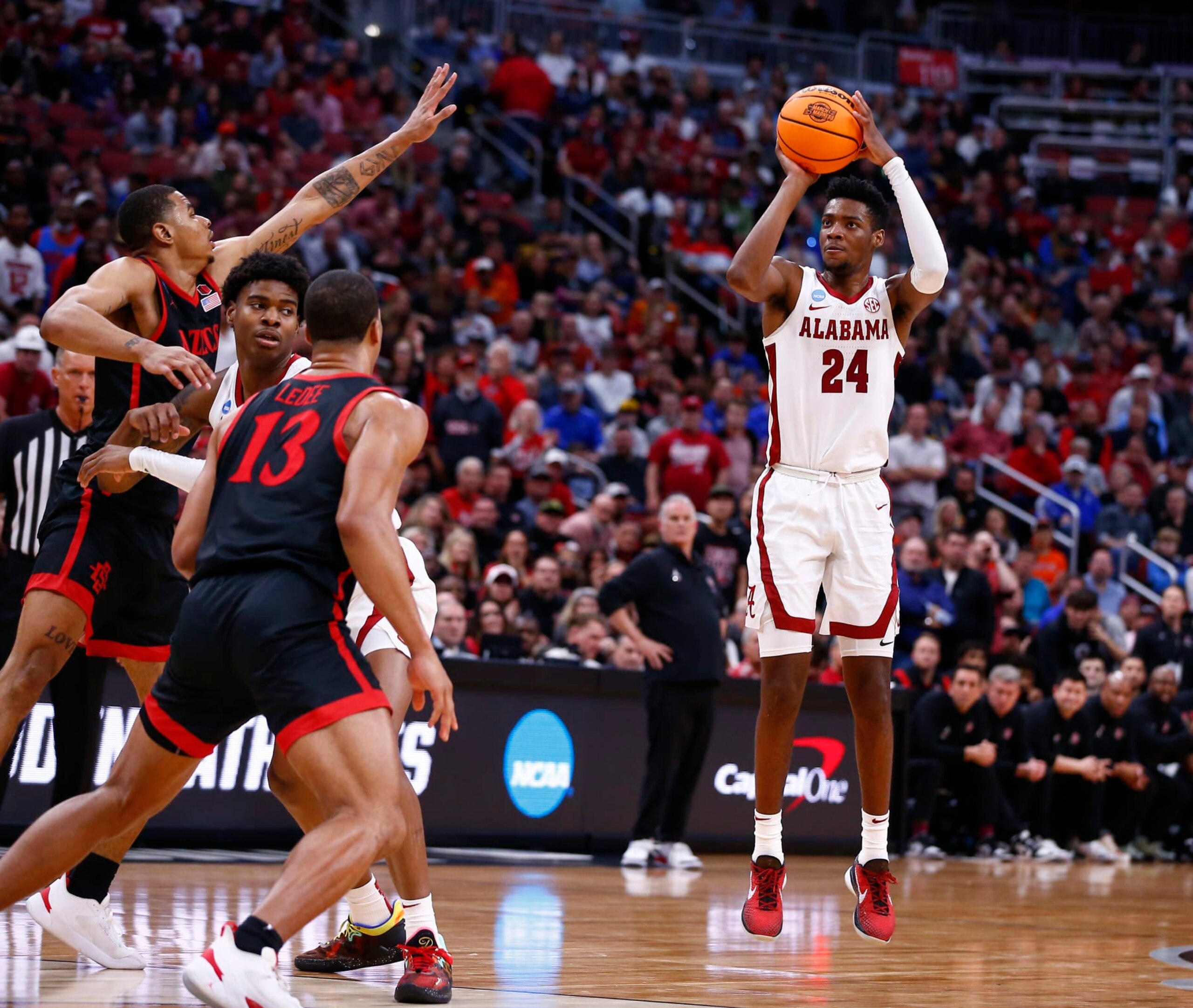 LOUISVILLE, KY - MARCH 24: Alabama Crimson Tide forward Brandon Miller (24) fires up his jump shot  during the San Diego State Aztecs versus the Alabama Crimson Tide in the Sweet Sixteen Round of the NCAA Men's Division I Basketball Championship South Regional on March 23, 2023, at KFC Yum! Center in Louisville, KY.  (Photo by Jeffrey Brown/Icon Sportswire via Getty Images)