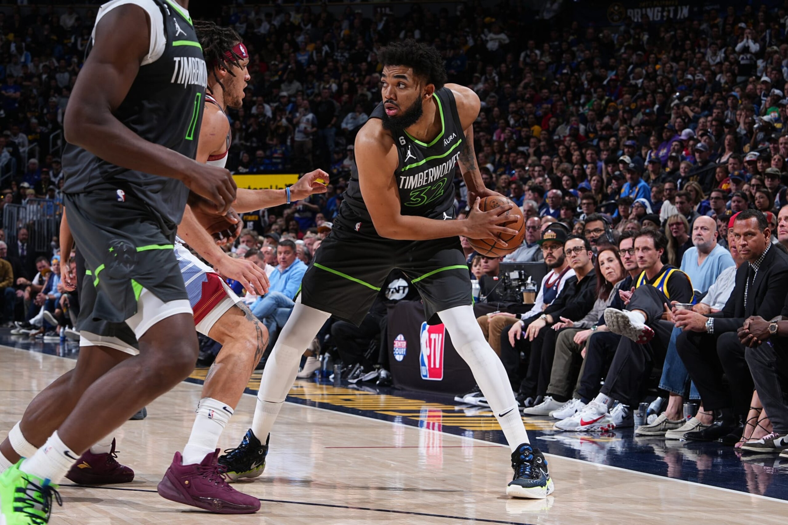 DENVER, CO - APRIL 25: Karl-Anthony Towns #32 of the Minnesota Timberwolves handles the ball during Round One Game Five of the 2023 NBA Playoffs against the Denver Nuggets on April 25, 2023 at the Ball Arena in Denver, Colorado. NOTE TO USER: User expressly acknowledges and agrees that, by downloading and/or using this Photograph, user is consenting to the terms and conditions of the Getty Images License Agreement. Mandatory Copyright Notice: Copyright 2023 NBAE (Photo by Garrett Ellwood/NBAE via Getty Images)